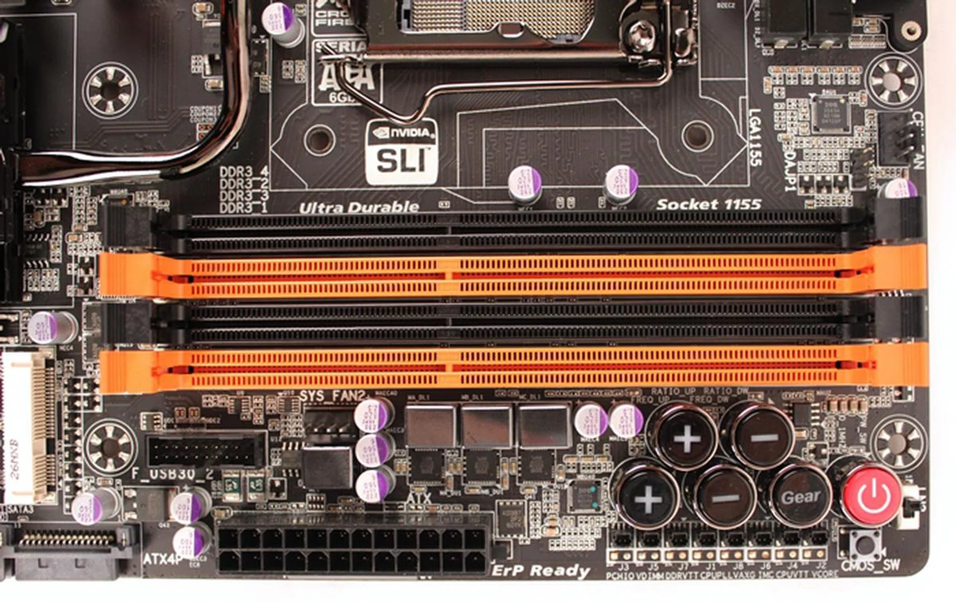 The clear CMOS button is located just below the red Power button, while the LN2 switch is located to the button's right.