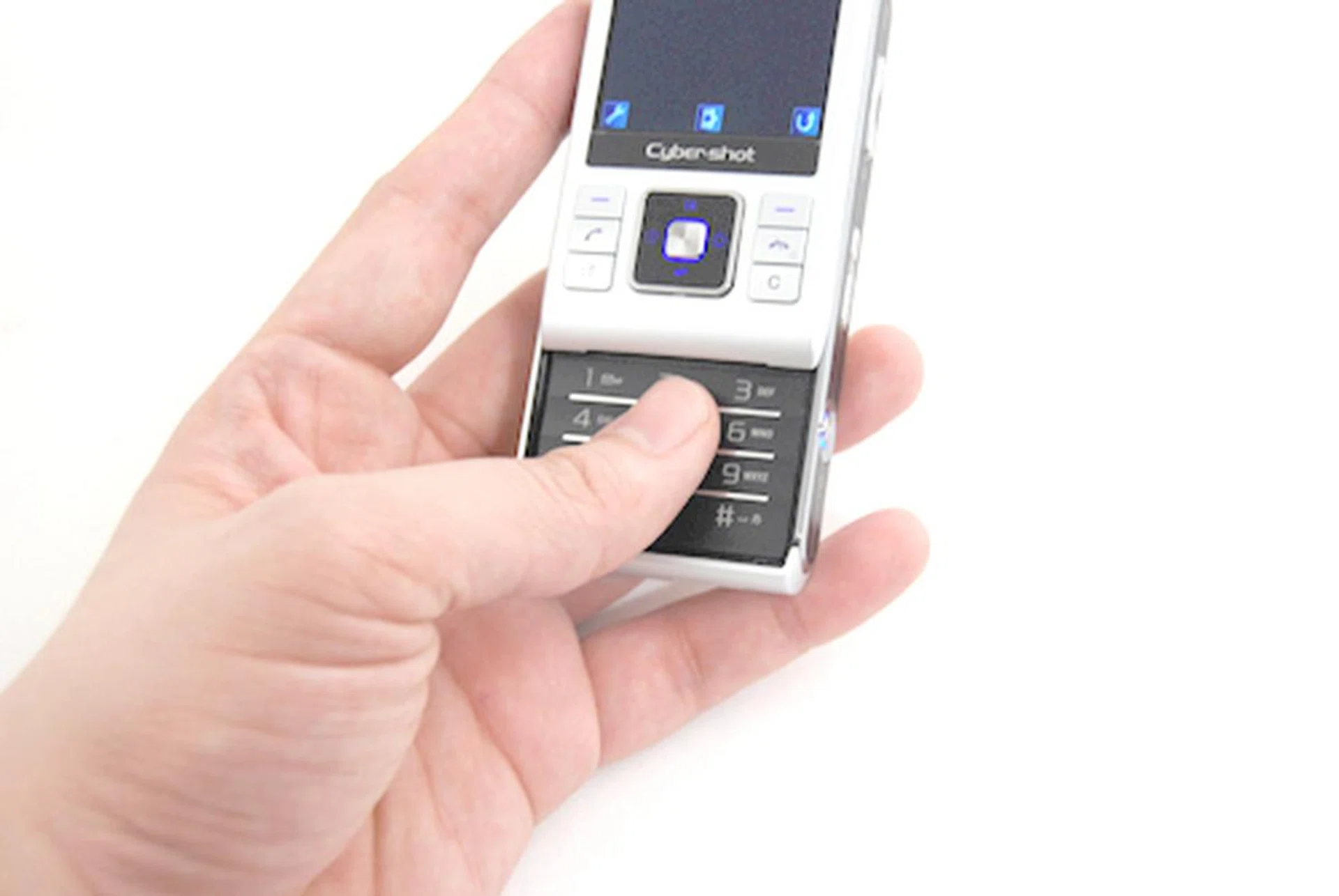 The C905 is the first of its Cyber-shot series to utilize a slider form factor. Notice how the individual keys are adequately spread out, but we had a rough time with its stiff keys.