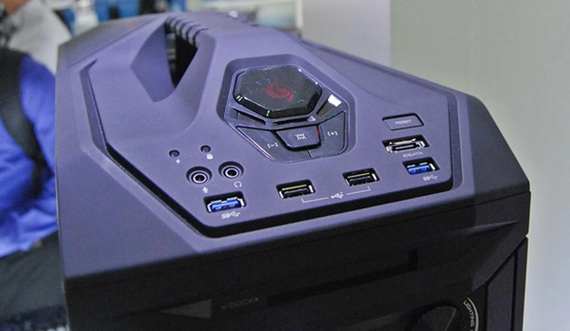 The sloped front panel of the CM Storm Trooper, and it extends into the sturdy carrying handle.