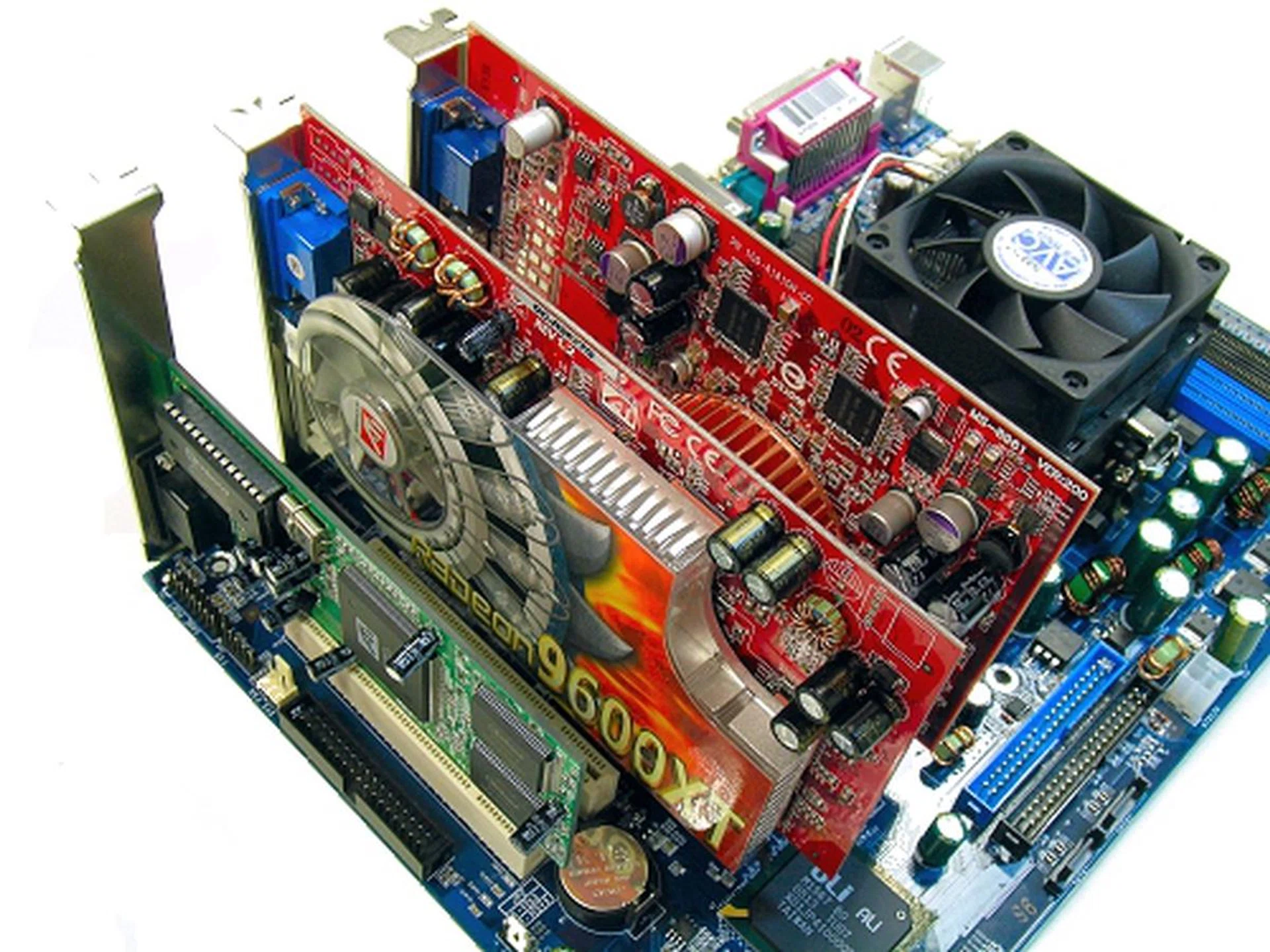 TGi in action. We had to dig up an old PCI graphic card, but Windows detected and installed drivers for all three without a fuss. Kudos to ULi for a working implementation.