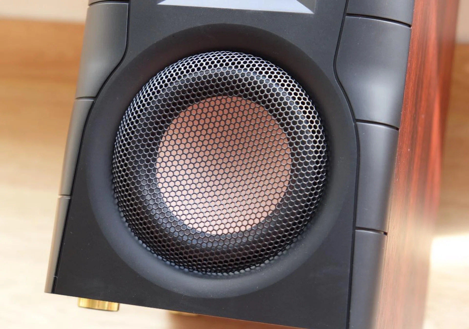 DSP can do remarkable things but it can't overcome the laws of physics. You need a larger drive if you want deeper bass.