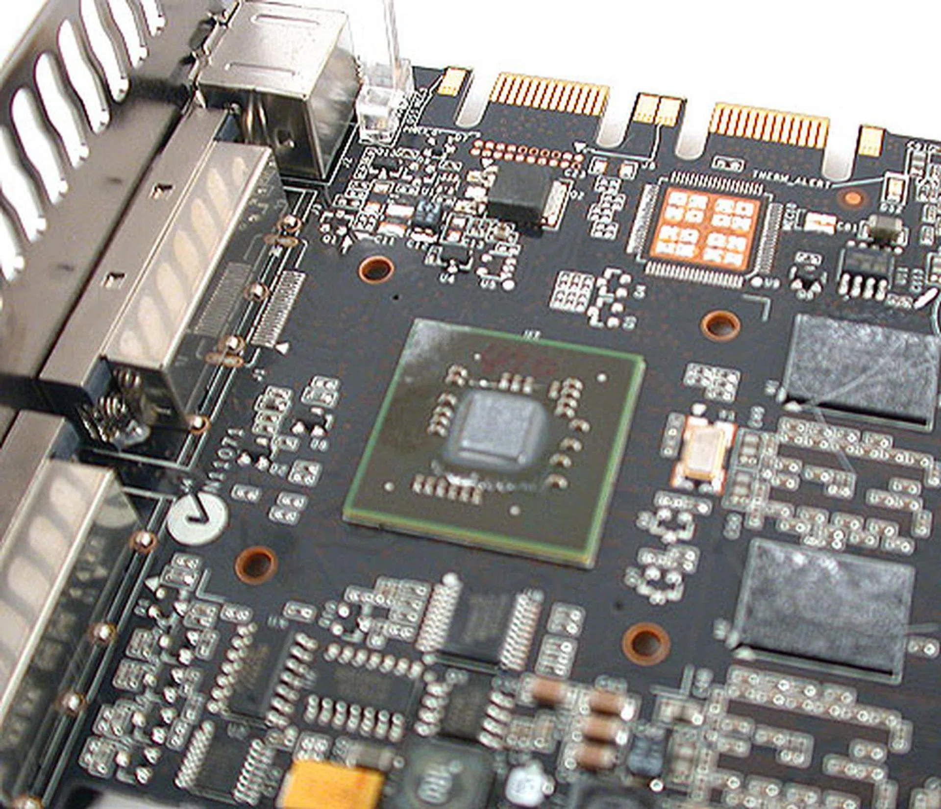 With the size of that die, it's no surprise that NVIDIA chose to use an external chip (more commonly known as the NVIO chip) to handle display I/O, like in the original GeForce 8800 GTX.