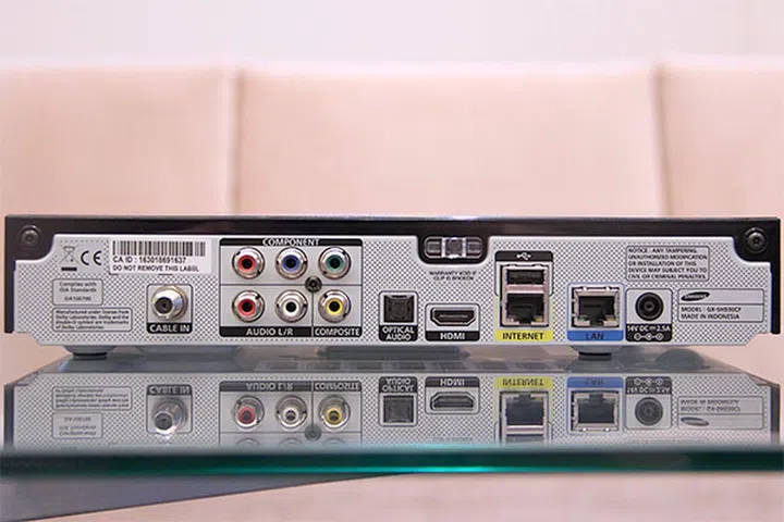 The HD interactive set-top box has no TV-out connection, so you can't do a signal pass-through to a third-party recording device.