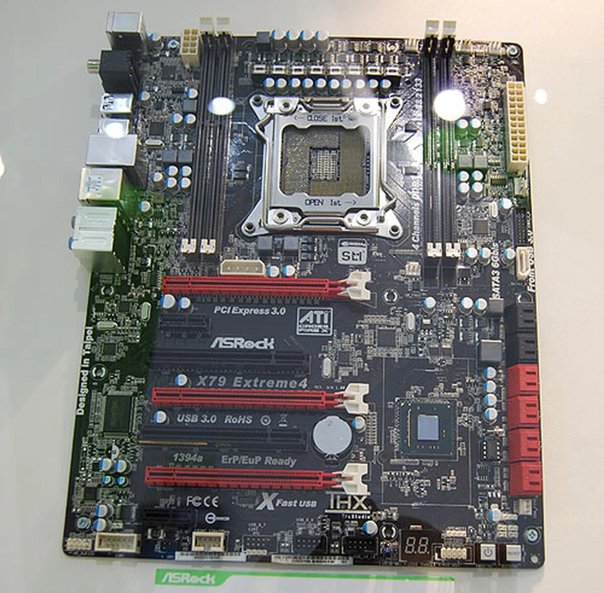 Like other motherboard vendors, ASRock was ready to display its X79 based board, the Extreme4. From what we can tell, it looks like a retail unit. 3-way SLI and CrossFireX and up to 12 SATA ports are some of the features you can expect.