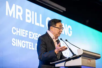 Singtel’s Digital InfraCo’s CEO Bill Chang speaking
at the launch of RE:AI, its latest Al cloud offering to
democratise AI. He shared how the platform will
involve building an ecosystem of solutions and
services, forge partnerships with key industry
leaders and develop the next generation of AI talent
among other initiatives. Photo: Singtel.