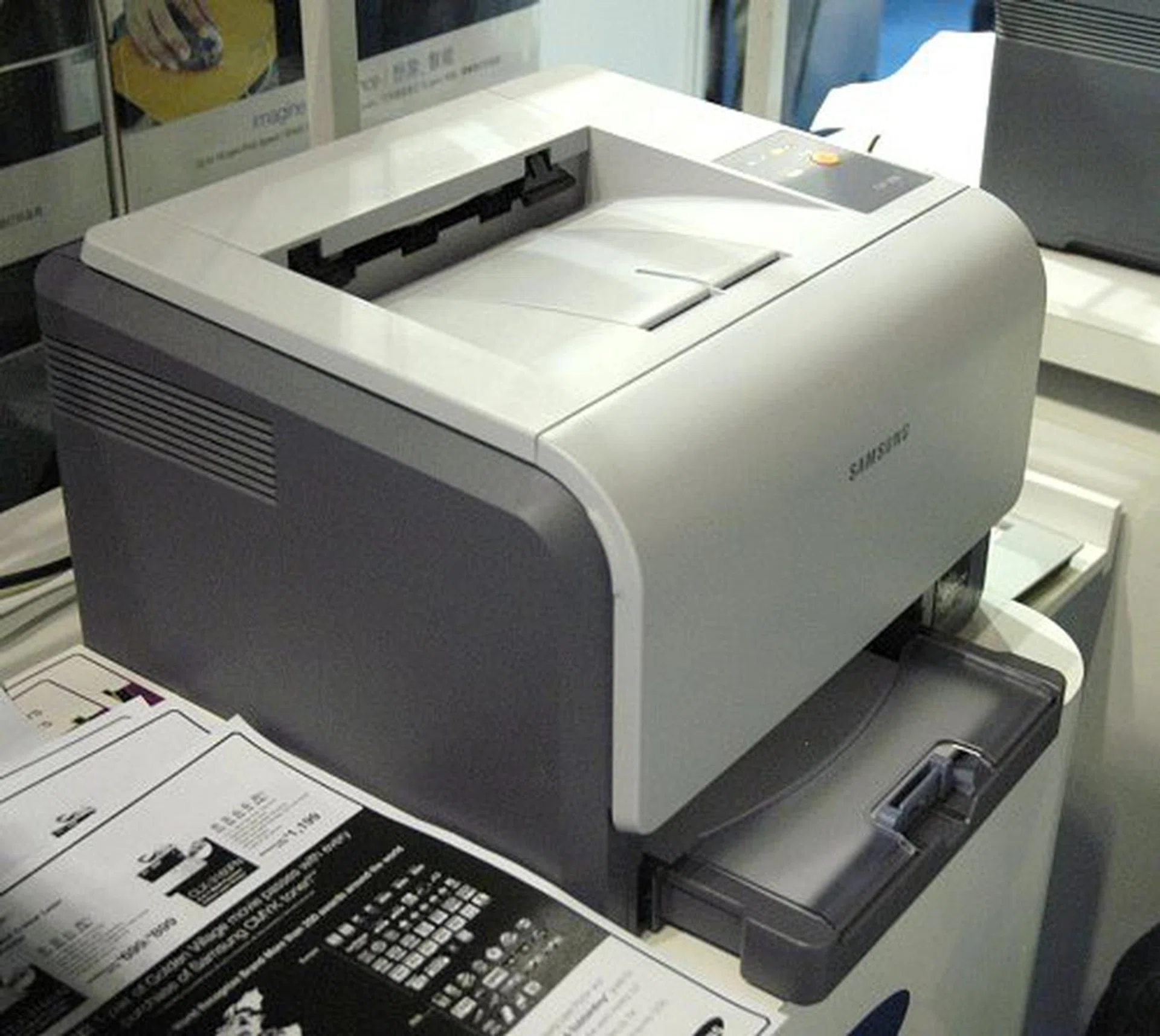  The CLP-300 is what Samsung dubbed as the world's smallest color laser printer and judging by the size of the thing, they do have a strong point. It prints 16ppm (mono) and 4ppm (color), all being absolutely quiet at 48dBA while it is rolling out printed pages. The promotional price of $299 is limited to the first 300 customers and valid only if you buy 1 set of CMYK toner.  
