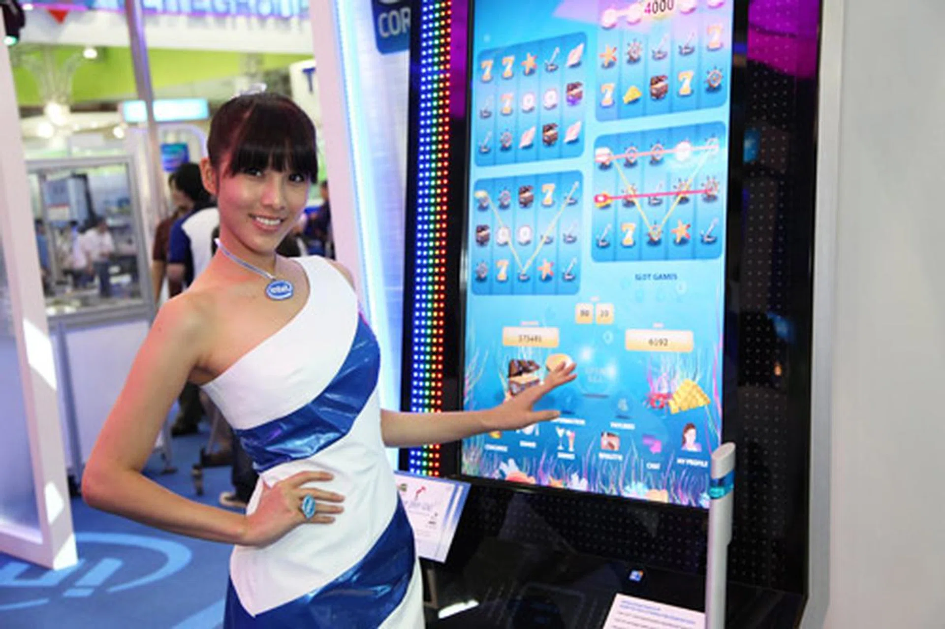 An interactive slot machine with a 46-inch vertical touch screen driven by Intel vPro technology, Intel integrated graphics and Windows 7. It features multiple slot reels, real-time roulette play and a 22-inch digital sign. Placing multiple bets were never this easy.