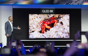 Dave Das, SVP at Samsung Electronics America, unveiling the 98-inch QLED 8K. (Image source: Samsung.)