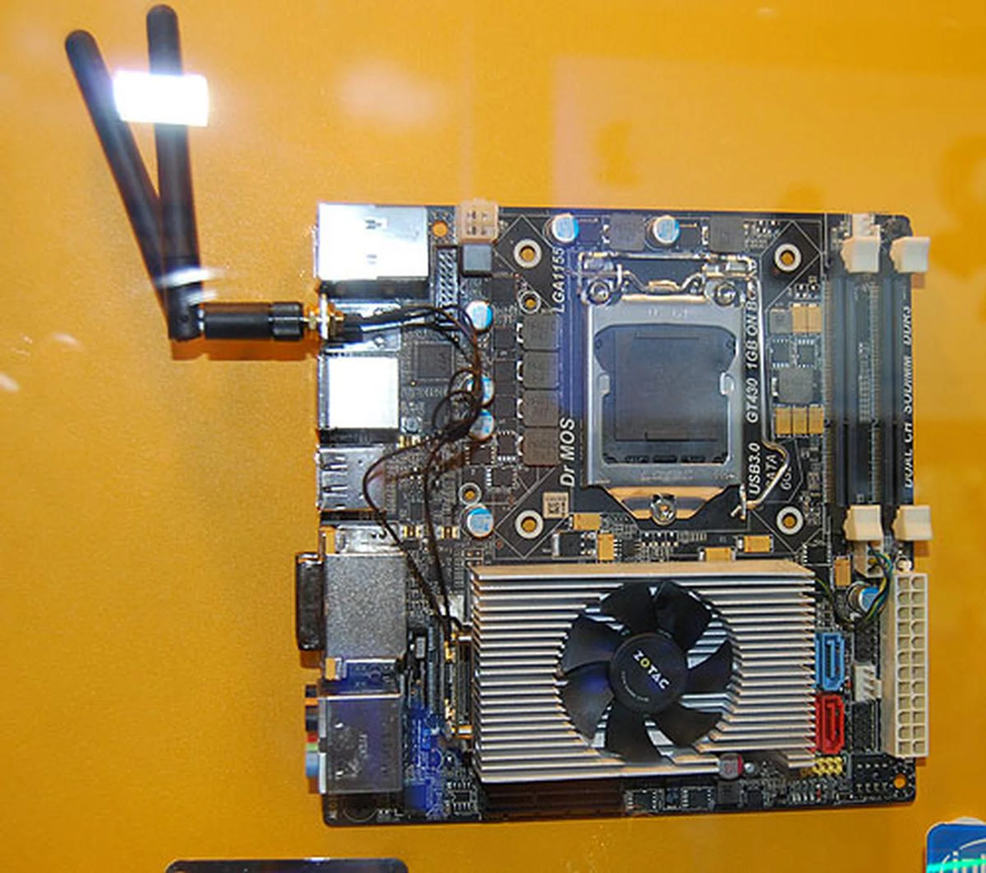 Shrinking the Z68 chipset to the mini-ITX form factor, the Zotac Z68-ITX WiFi comes with NVIDIA GT 430 1GB mounted on the board. It uses SODIMM memory modules (DDR3-2133) to conserve space and has both SATA 6Gbps and USB 3.0 ports. 