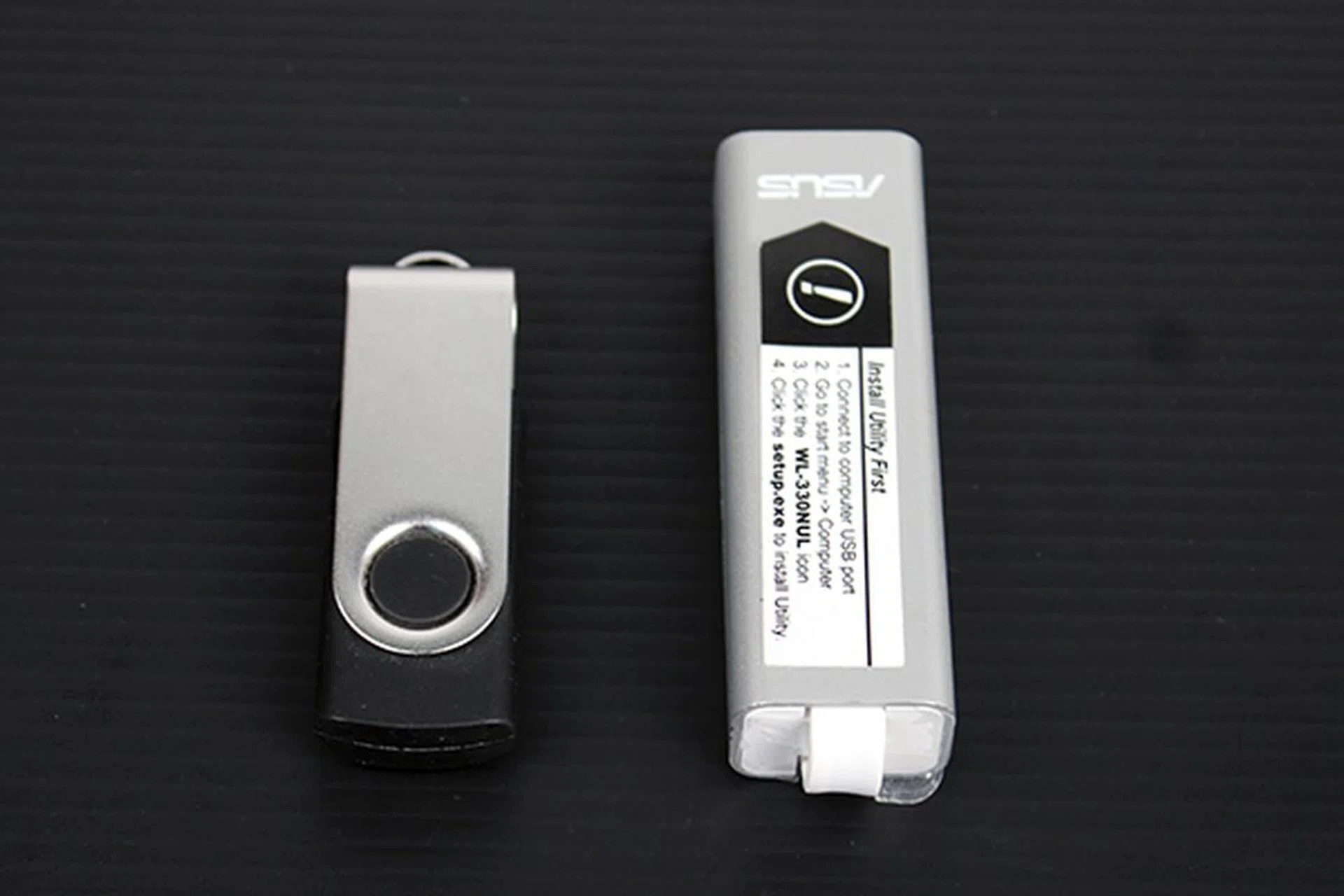 The ASUS WL-330NUL Pocket Router is slightly larger than your typical USB flash drive.