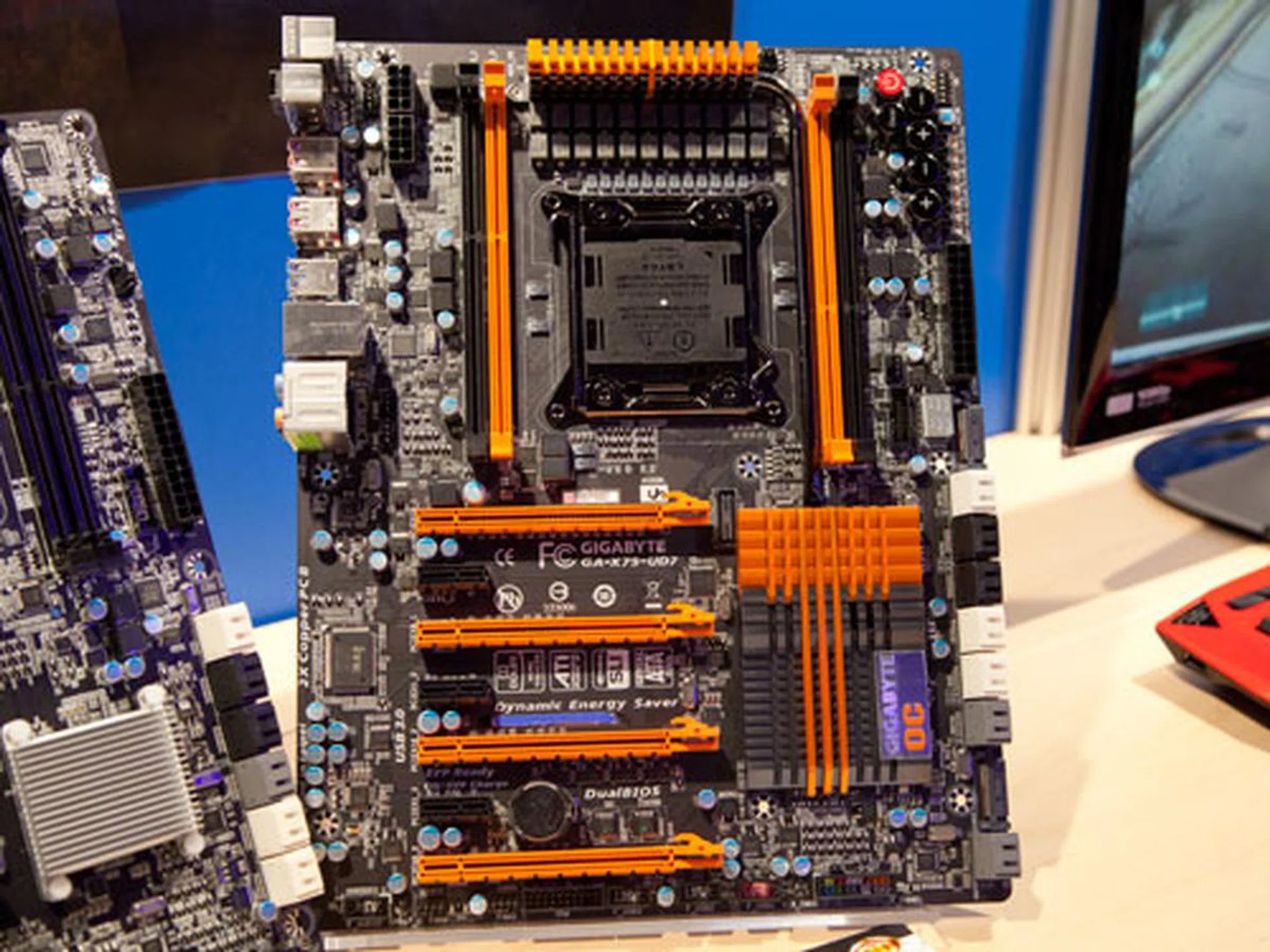 The Gigabyte GA-X79-UD7 features more PCIe graphics slots for up to 4-way SLI/CrossFireX multi graphics configuration. The board also comes with Gigabyte's proprietary OC Touch, OC-Cool, OC-DualBIOS and OC PEG features. The UD7 also boasts of an extreme 20 phase VRM power design, enabling even greater overclocking capabilities.