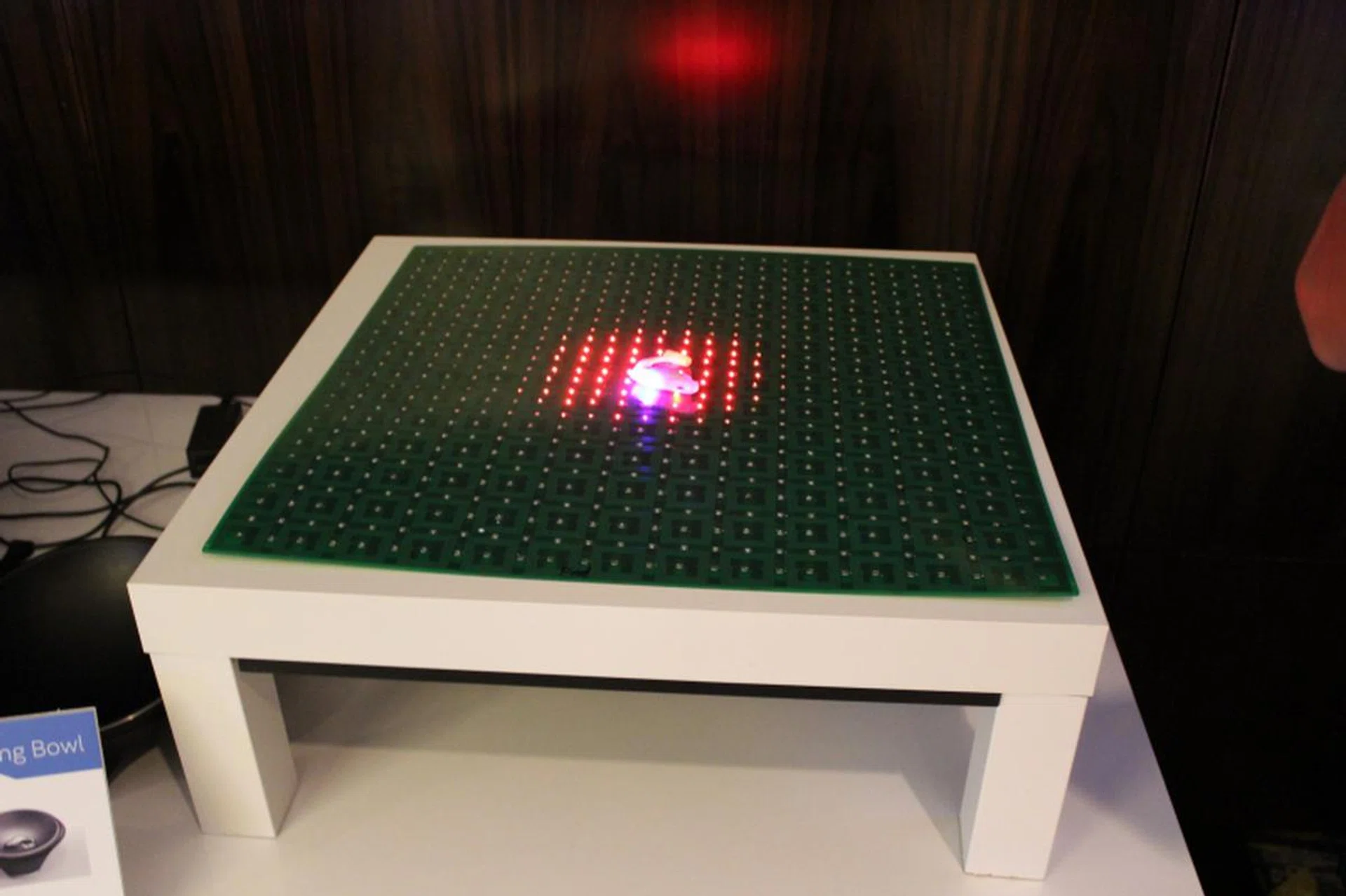 The red area is where the energy is concentrated but the whole mat can be filled with charging capability. One thing to note, the wireless charger is not the mat itself (it just shows the energy output area), but rather, the base underneath it.