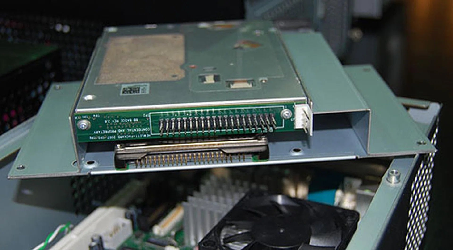  You can fit a slim optical drive and a 2.5-inch hard drive into the ML03.  