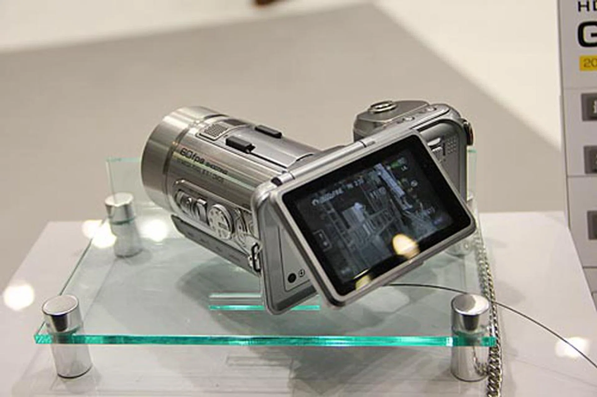 This is the JVC GC-PX1. It's a camcorder that shoots 1080p (60 fps) videos at 36 Mbps, and still photos at 10 megapixels. It's equipped with a 10x optical zoom lens (38.5 - 385 mm in 35 mm equivalent), 32 GB internal storage, 3-inch touch LCD, and JVC's FalconBird image processor.