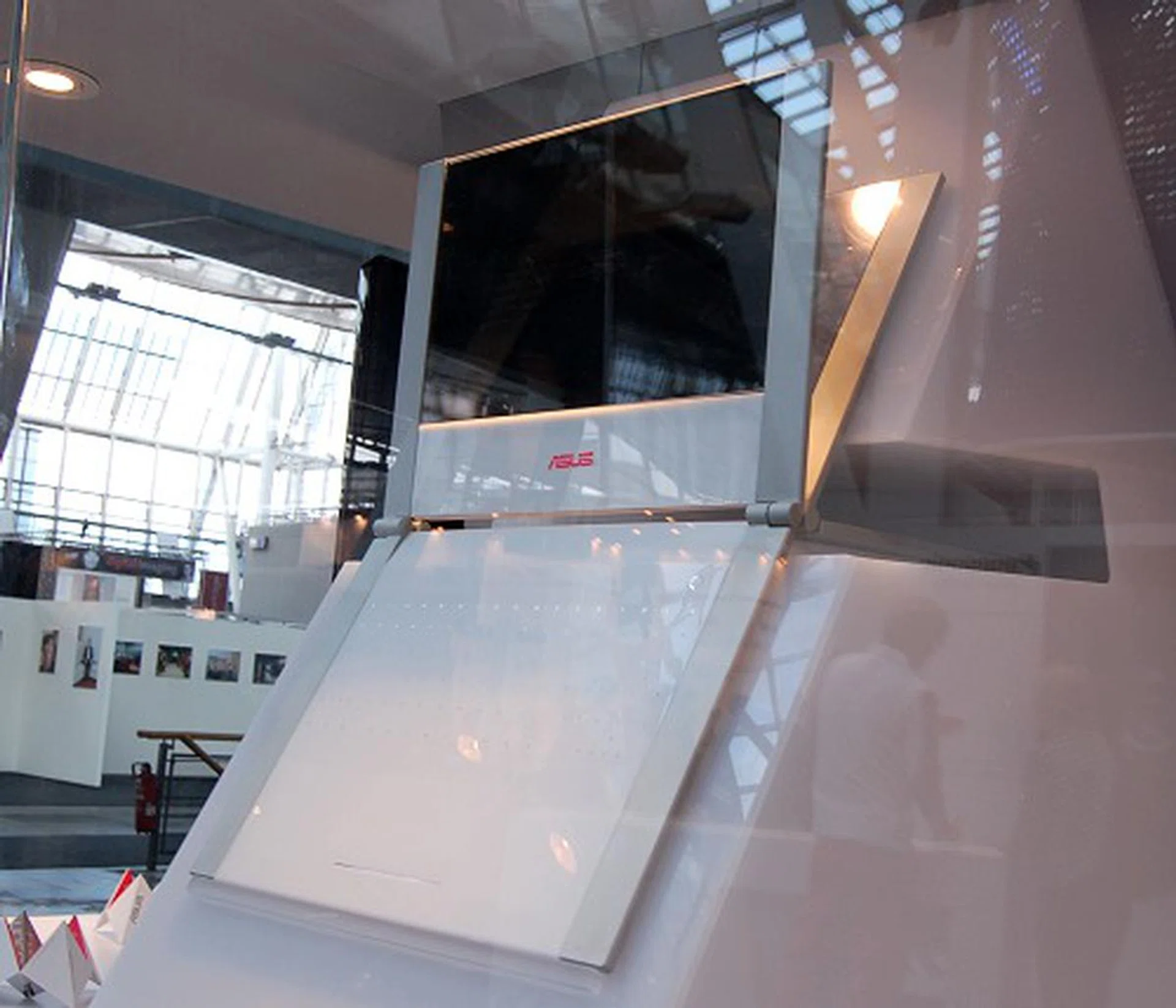  And here's an actual concept PC that's been built for usability testing. This particular 'Flat Sharing' model would have multiple touch-screen displays and a multi-user interface all on the same notebook. The multiple displays can be flipped like a book.  