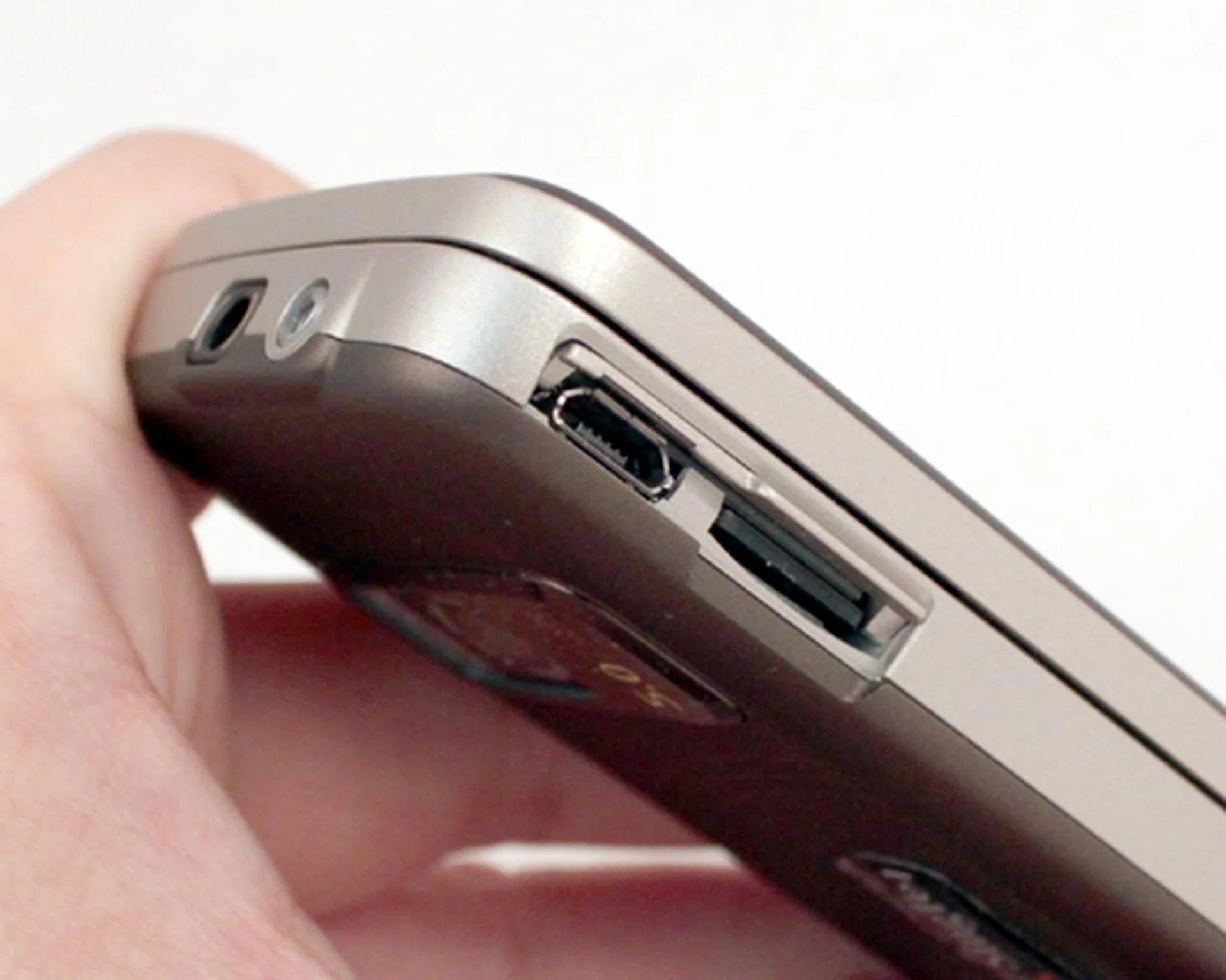 But when you want to access both ports, it flips up and into the chassis. Voila, easy access to your microSD card and microUSB port. Better yet, no dangling plastic that makes it unsightly.