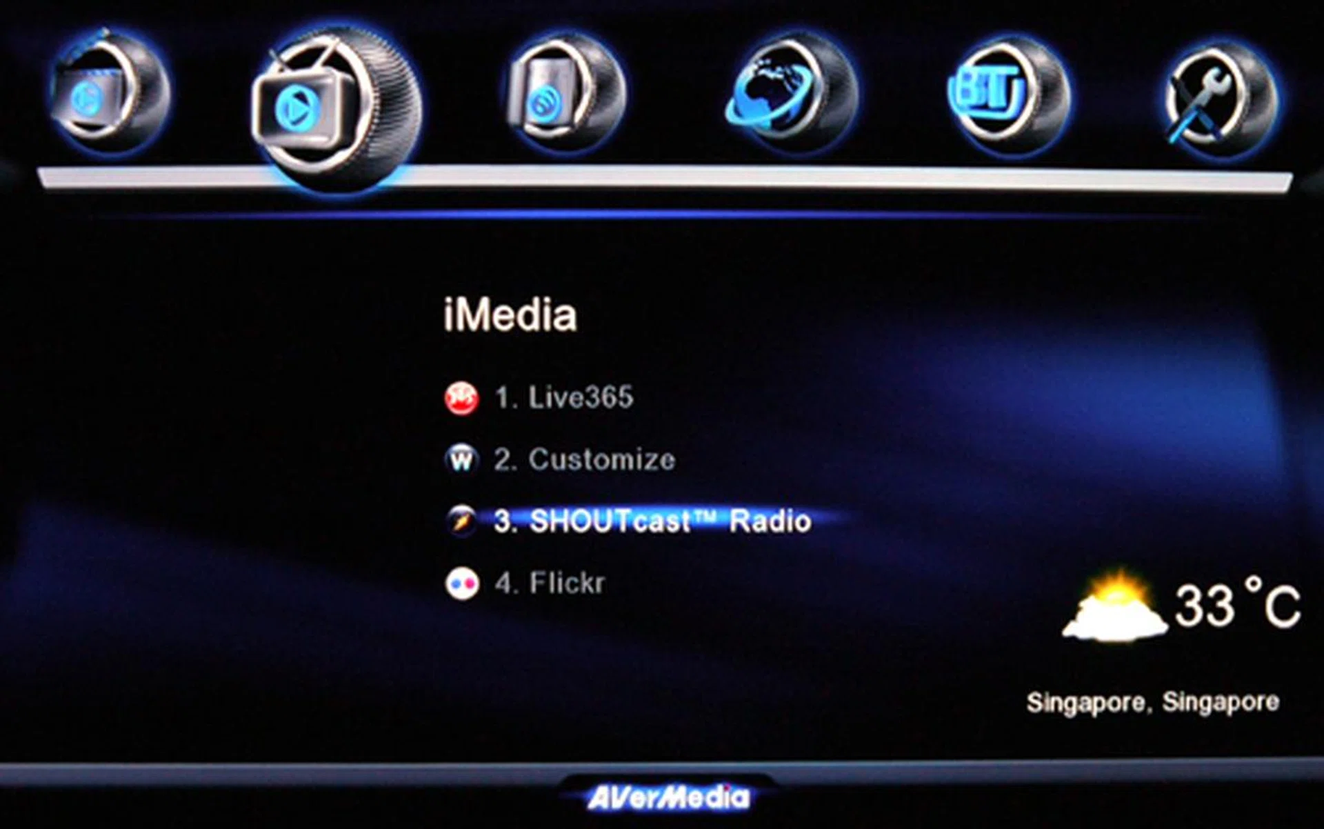 Go radio gaga with a comprehensive list of online radio stations found under the Live365 and SHOUTcast Radio selection. Assuming you are online and you've set your location prior, you should see a little weather widget at the bottom right of your screen as well.