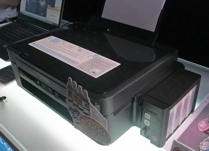 Pictured here is the L350. The ink tank is located on the printer's right. Unlike conventional inkjet printers which utilize ink cartridges, the L-series uses ink tanks. 