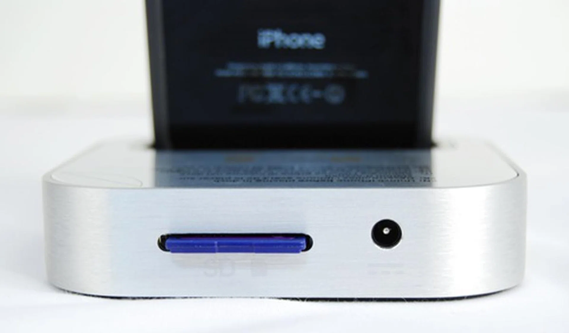 The SD slot and power connector are carefully labelled and tucked out of sight.