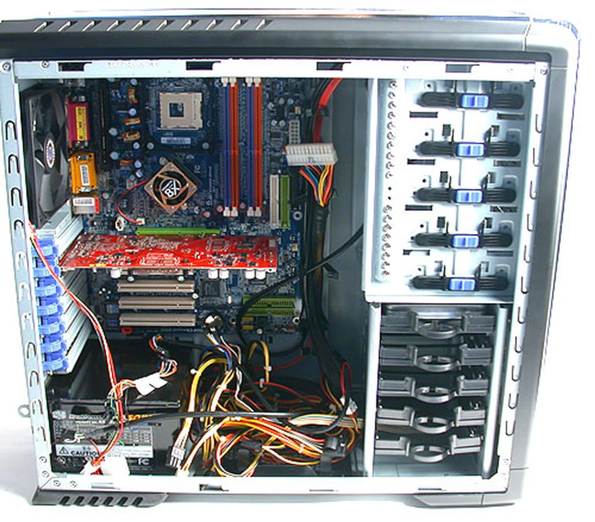 With the basic components installed, it gets a little crowded in the CM 690. The bottom where the PSU is located is particularly messy with all the power cables, but the cable management tools has its use, provided you have the patience to plan and route your cables. 