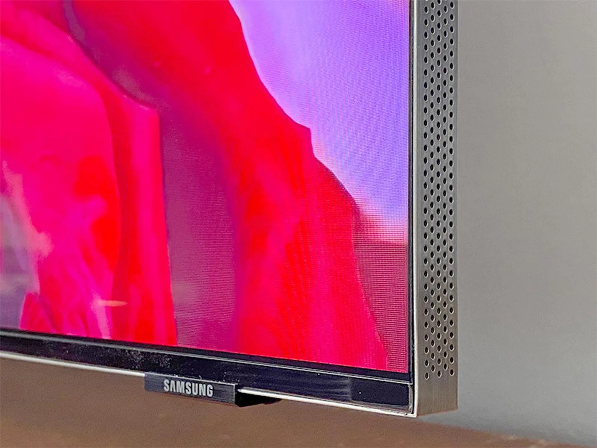 The Q950T cabinet measures just 15mm. The tiny holes along the frame are necessary for the sound to come out.