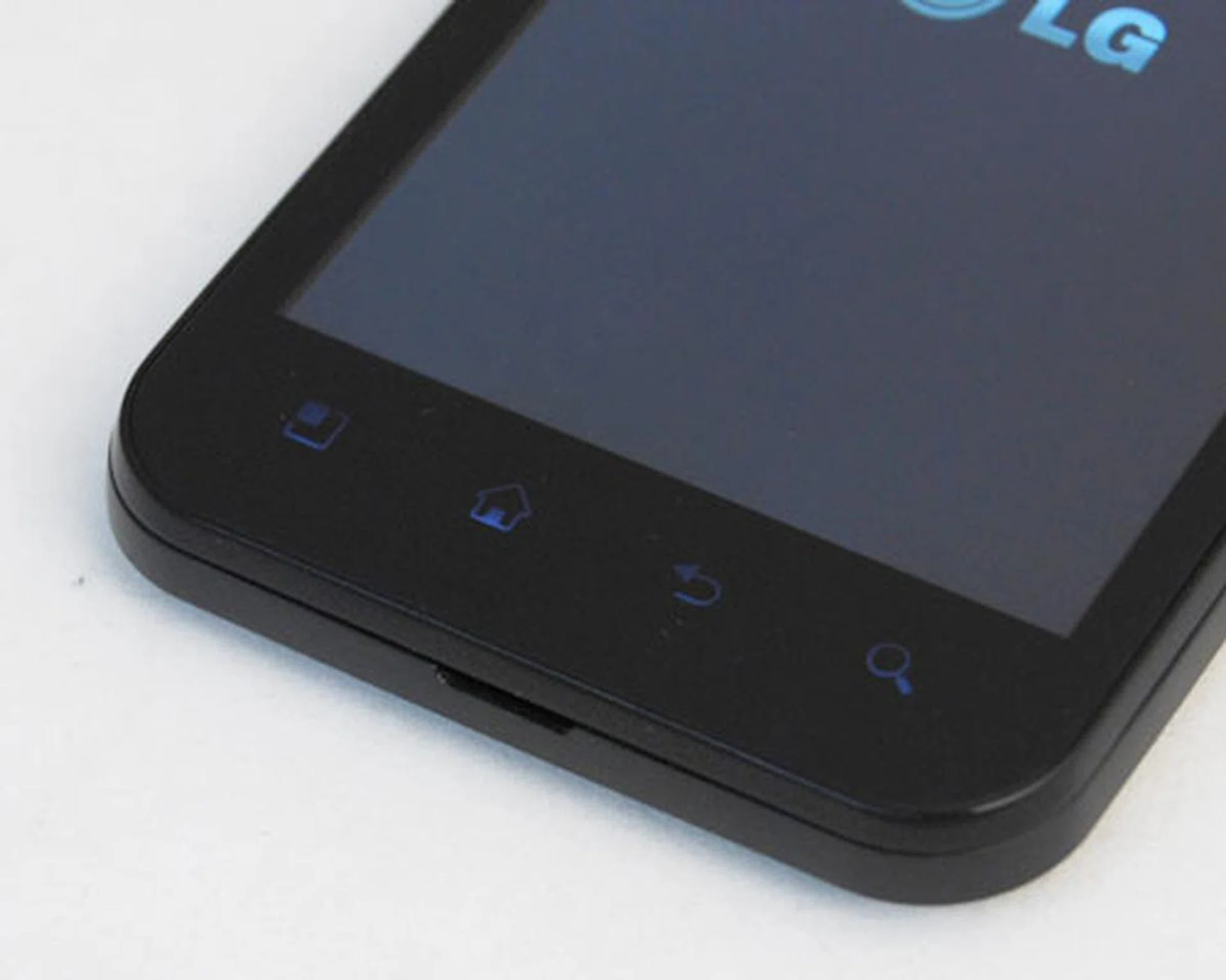 ...the Optimus Black awakens from standby mode, revealing four touch-sensitive buttons below its 4-inch screen.