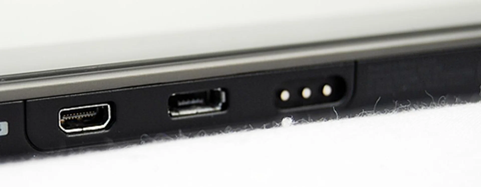 You can find the HDMI port (left), microUSB port (centre) and the charging contacts at the bottom of the PlayBook