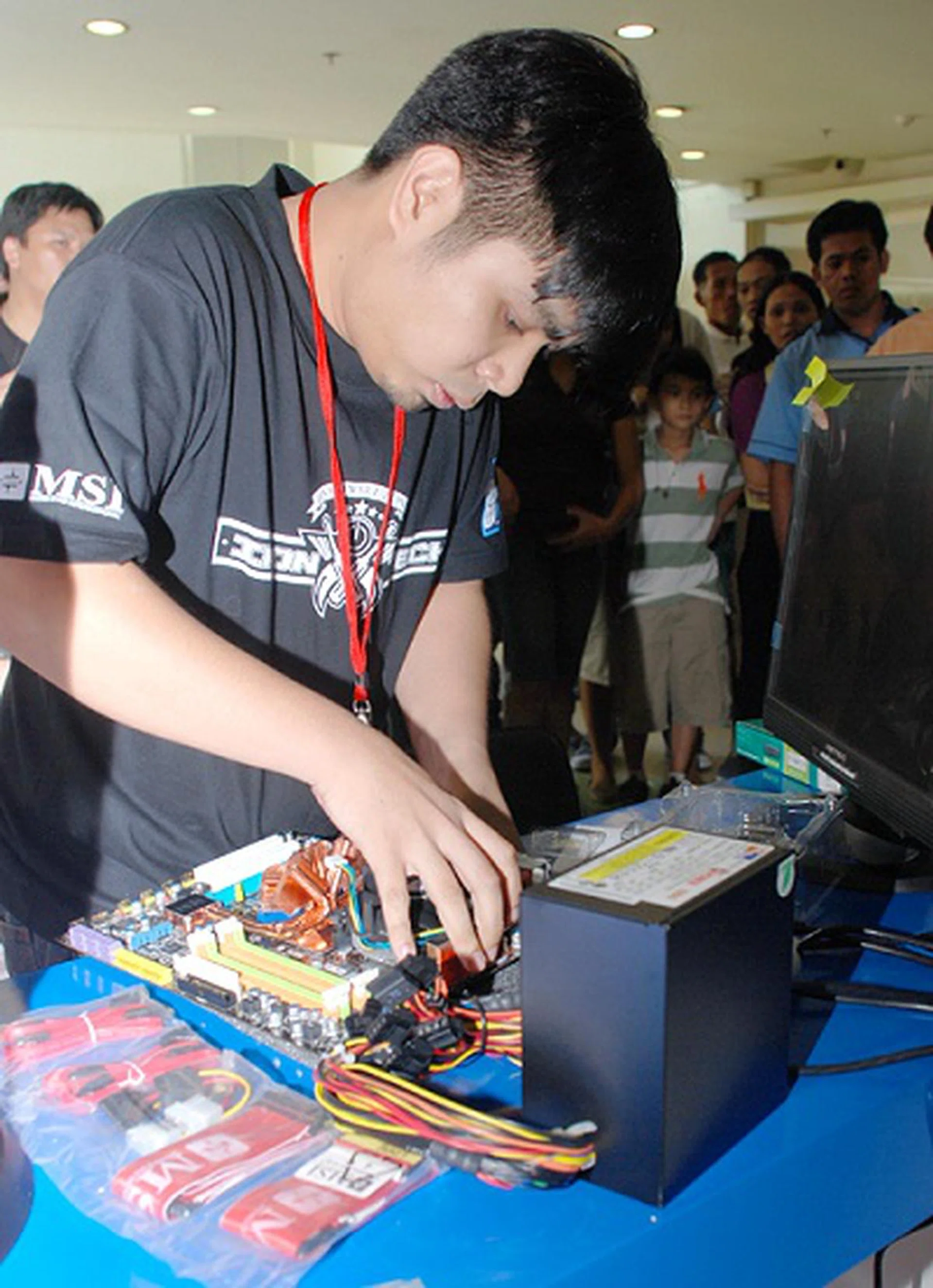  Gil Navarro caught in action as he mounts his CPU cooler.  