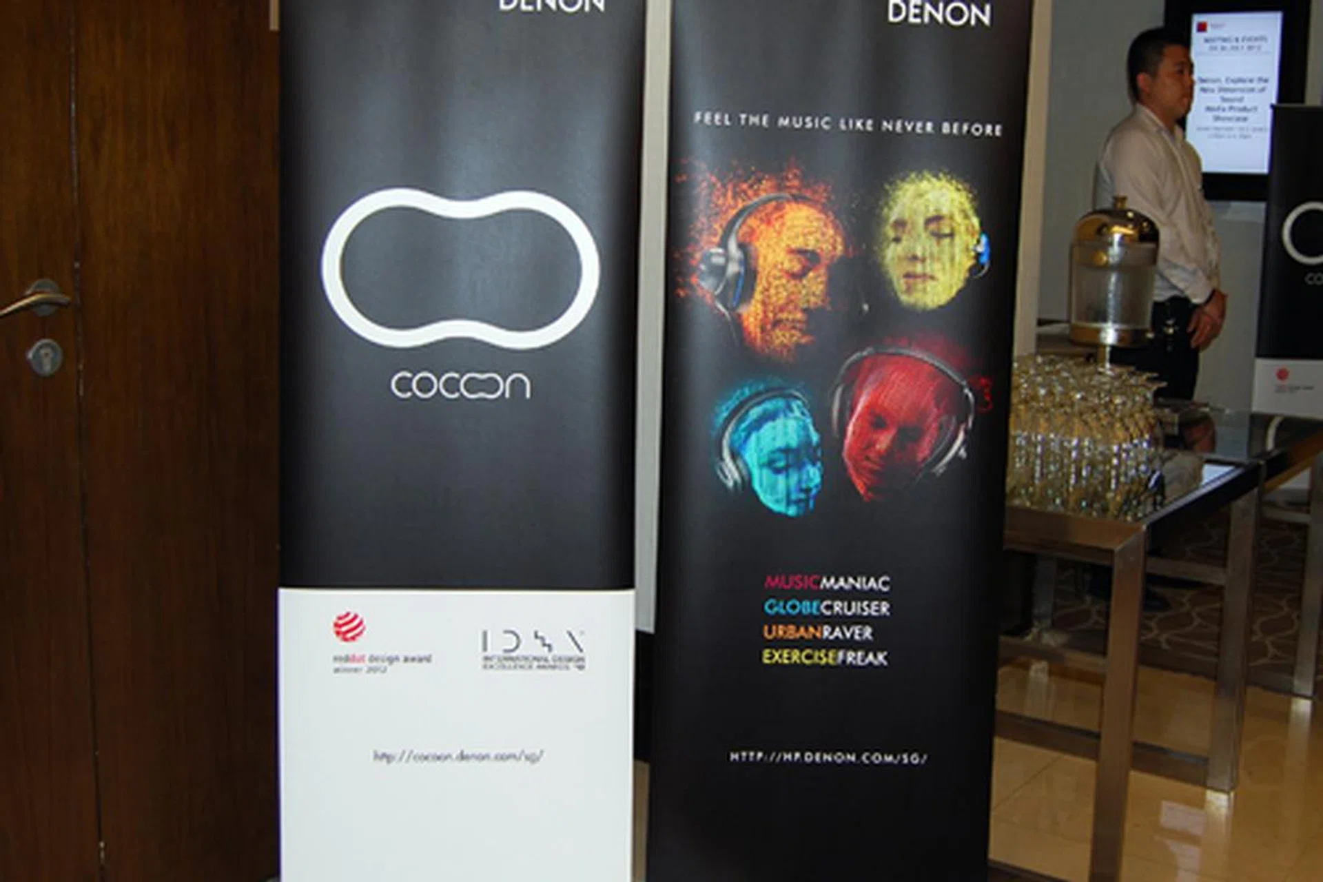 As proclaimed by the banners at the door, Denon is going mainstream with the introduction of docking speakers as well as end-user headphones.