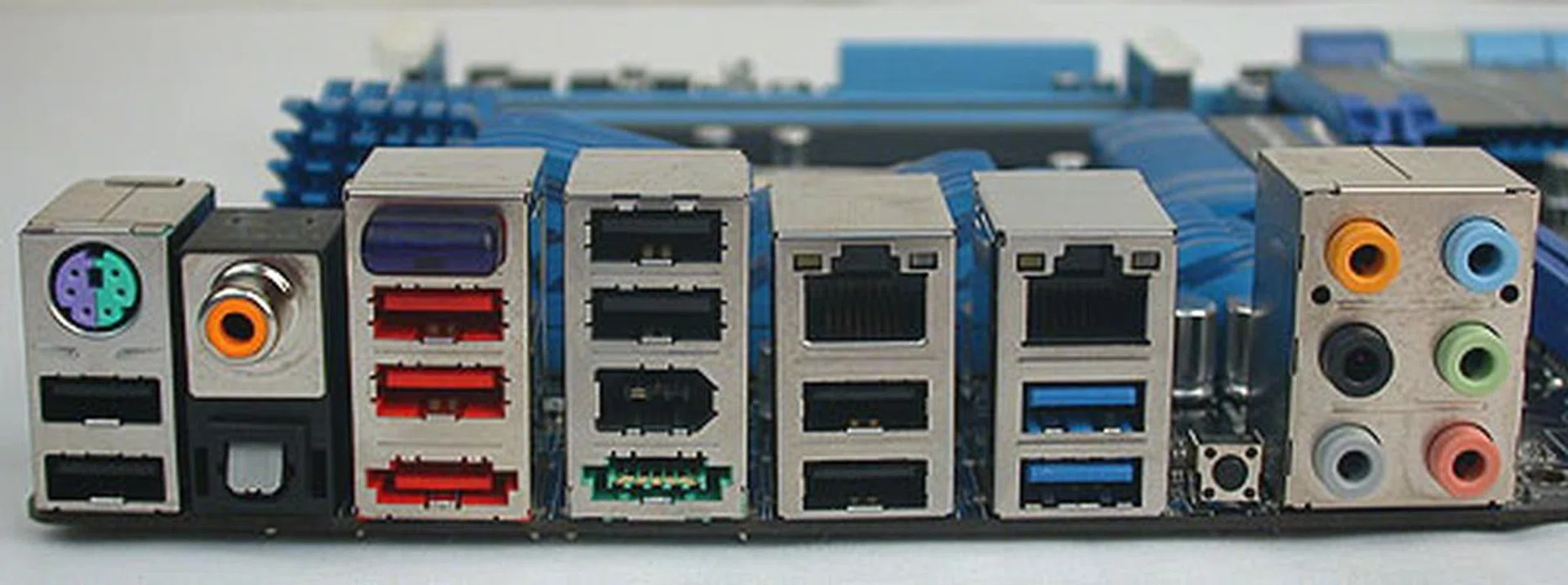 A full complement of ports at the rear, including the Bluetooth module protruding from the rear panel. You'll find both coaxial and optical S/PDIF outputs, up to eight USB 2.0 ports and two USB 3.0 ports (in blue), the dual Gigabit LAN ports, a Clear CMOS button and FireWire and two eSATA ports. 