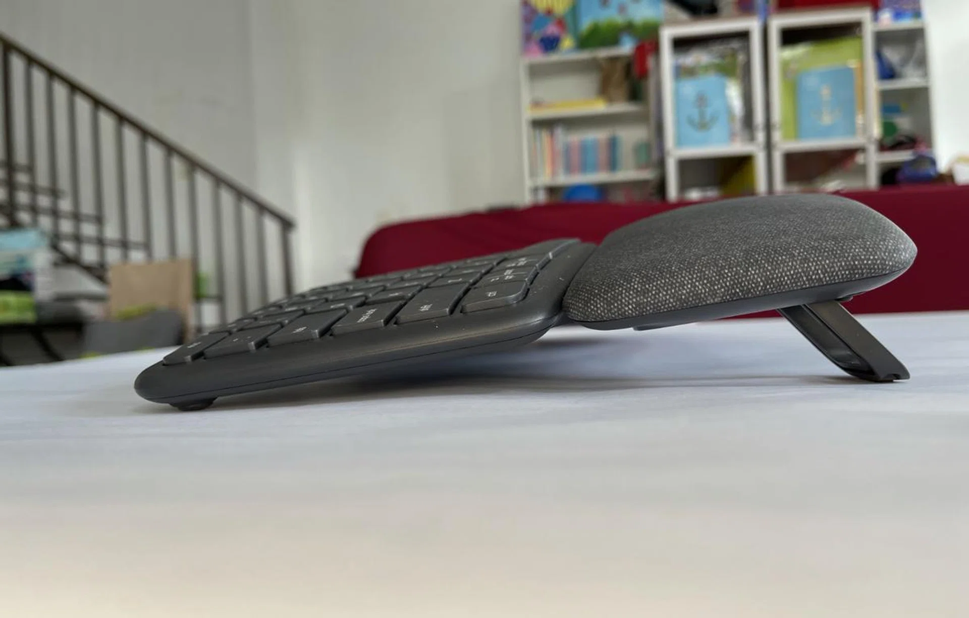 The little legs let you change the height of the keyboard. 