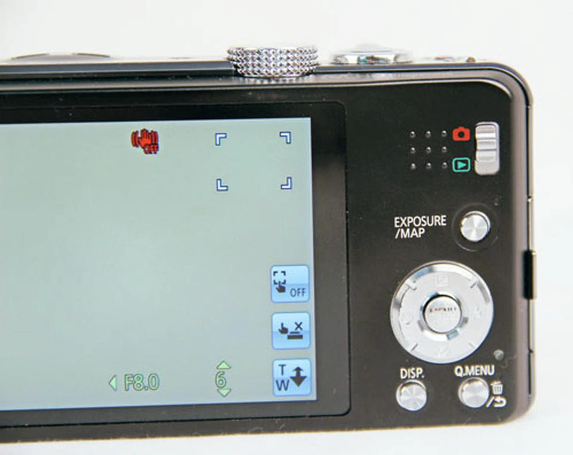 Buttons and d-pad could have been larger. The Playback mode is accessed via a switch instead of a button, so if you leave it at Playback mode, even pressing the shutter release button won't allow you to snap shots.