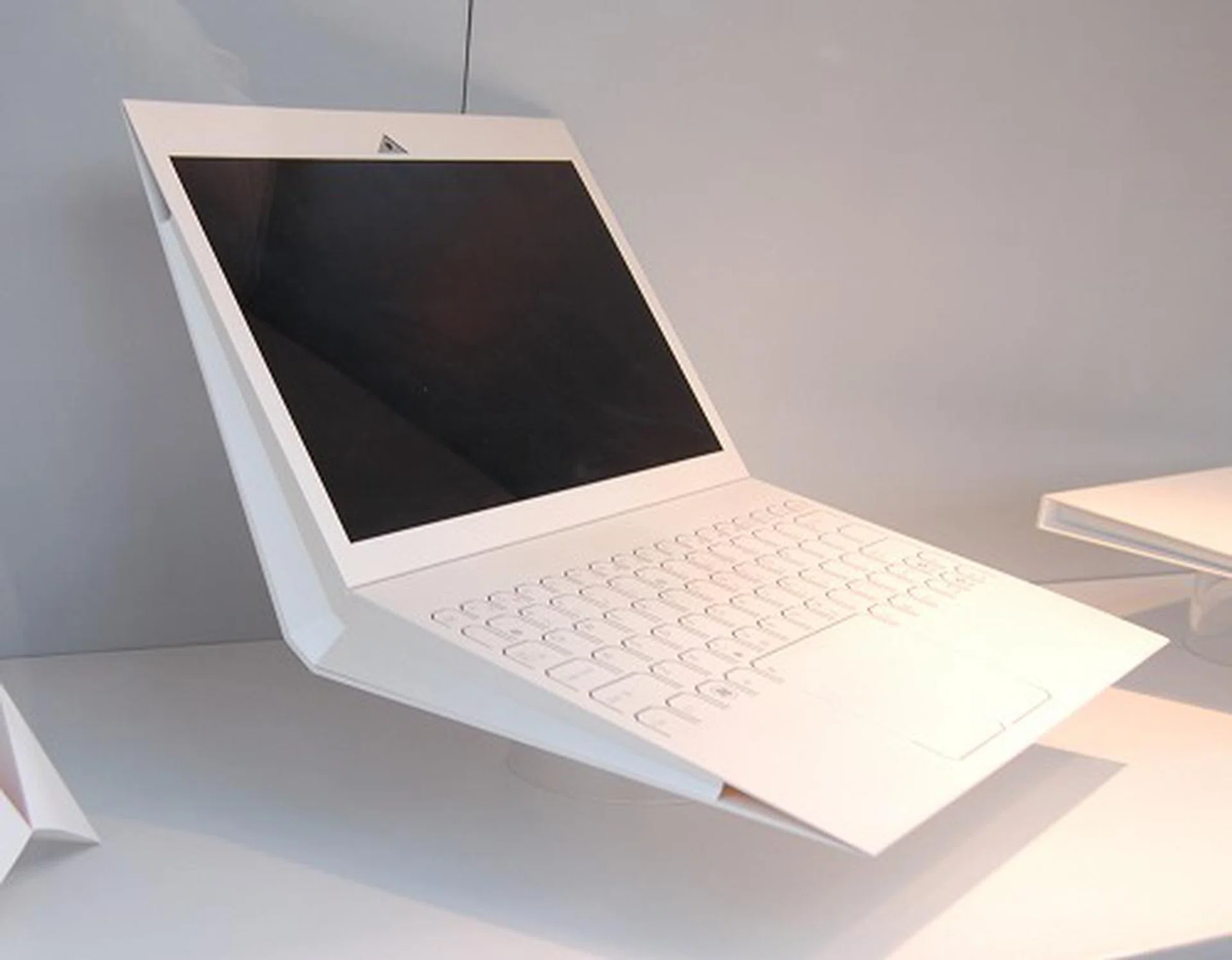  This one is inspired by Origami and is named Pure Fold. Look quite a bit like a paper folder. When do you think these will come true? We think it will be many more years, but it is a possibility, at least seeing that ASUS is actively building these prototypes for trial.  