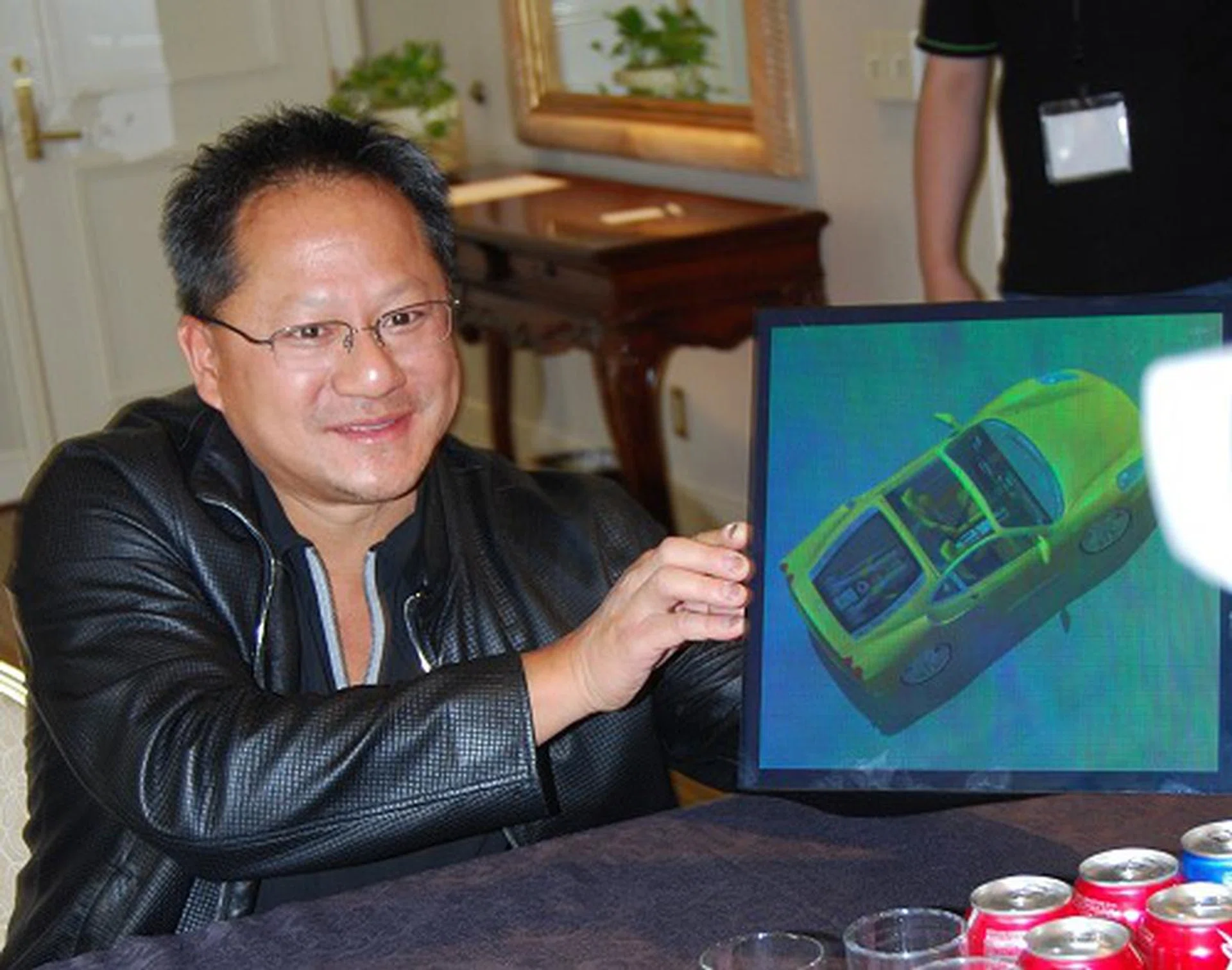 Here we caught Jen-Hsun enthusiastically showing off his liking for Ferrari cars using this hologram from Zebra Imaging. NVIDIA GPUs are used in the 3D modeling of the car before its fit for use in this hologram. Now who would have thought such realistic holograms would have been possible 10 years ago?