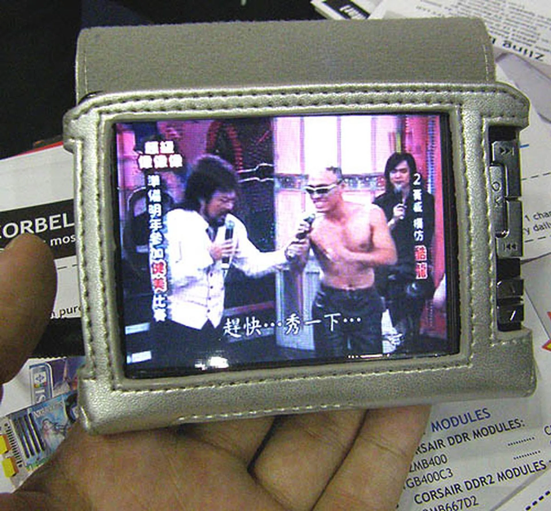  Capable of playing MP3 & MP4, the Zling Studio is a portable player with a 3.6-inch color TFT LCD display. It has a capacity of 1GB and accepts SD/MMC cards. For the IT show only, it's selling at $189 instead of its usual price of $239.  