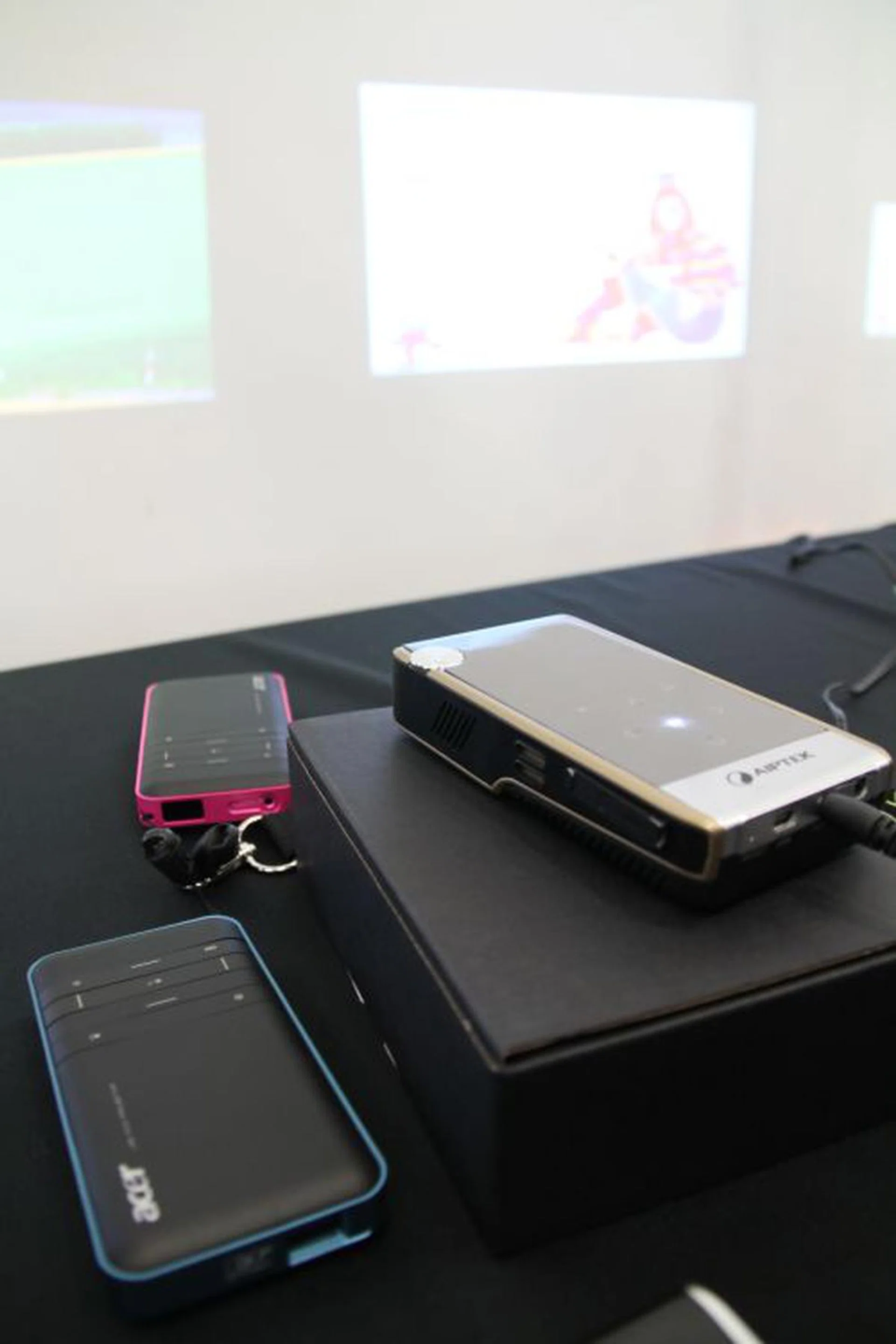 Texas Instruments showed us several pico projectors it has been working on with different technology brand partners -- including these two new ones from Acer and Aiptek. 