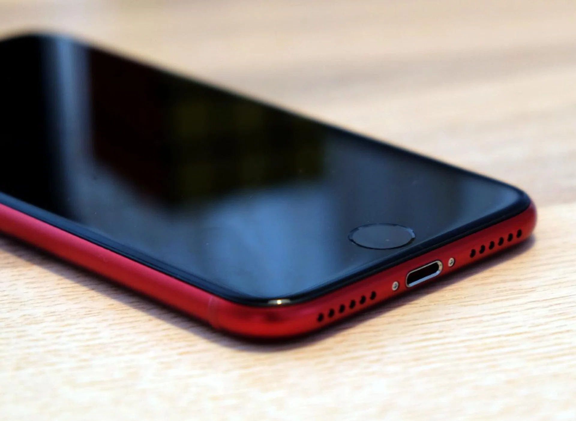 You can charge the iPhone SE wirelessly or via its Lightning port.