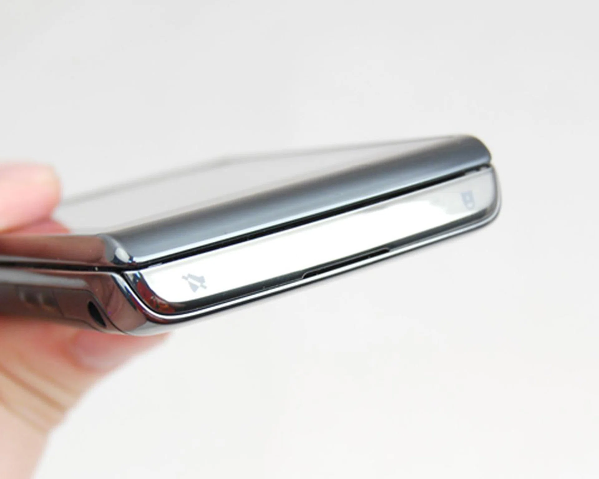 The lock button is accessible, but not to the point that it unlocks the phone by accident when it's in your pocket.