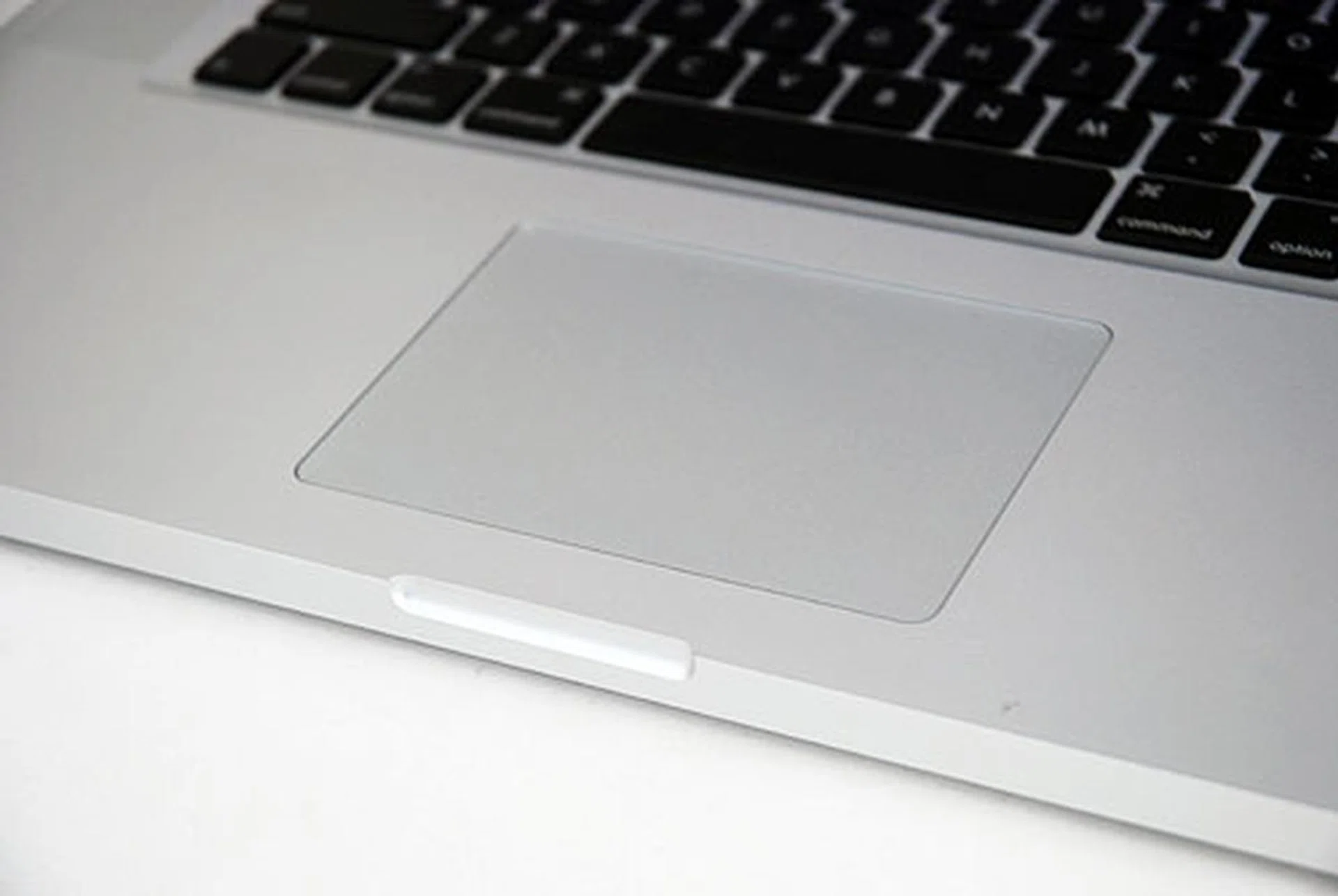 The trackpad of the newer MacBook Pro notebooks features inertial scrolling, which we guess is a software feature that may be implemented in the older MacBook Pros in due time.