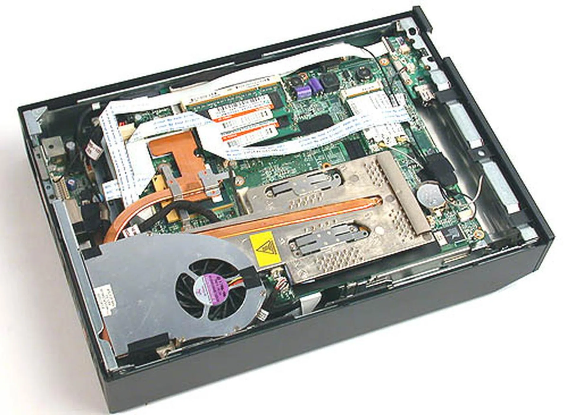 Space is a premium inside the X100. All the components look as cramped as a notebook, but there are a few upgrade options for the enthusiasts.