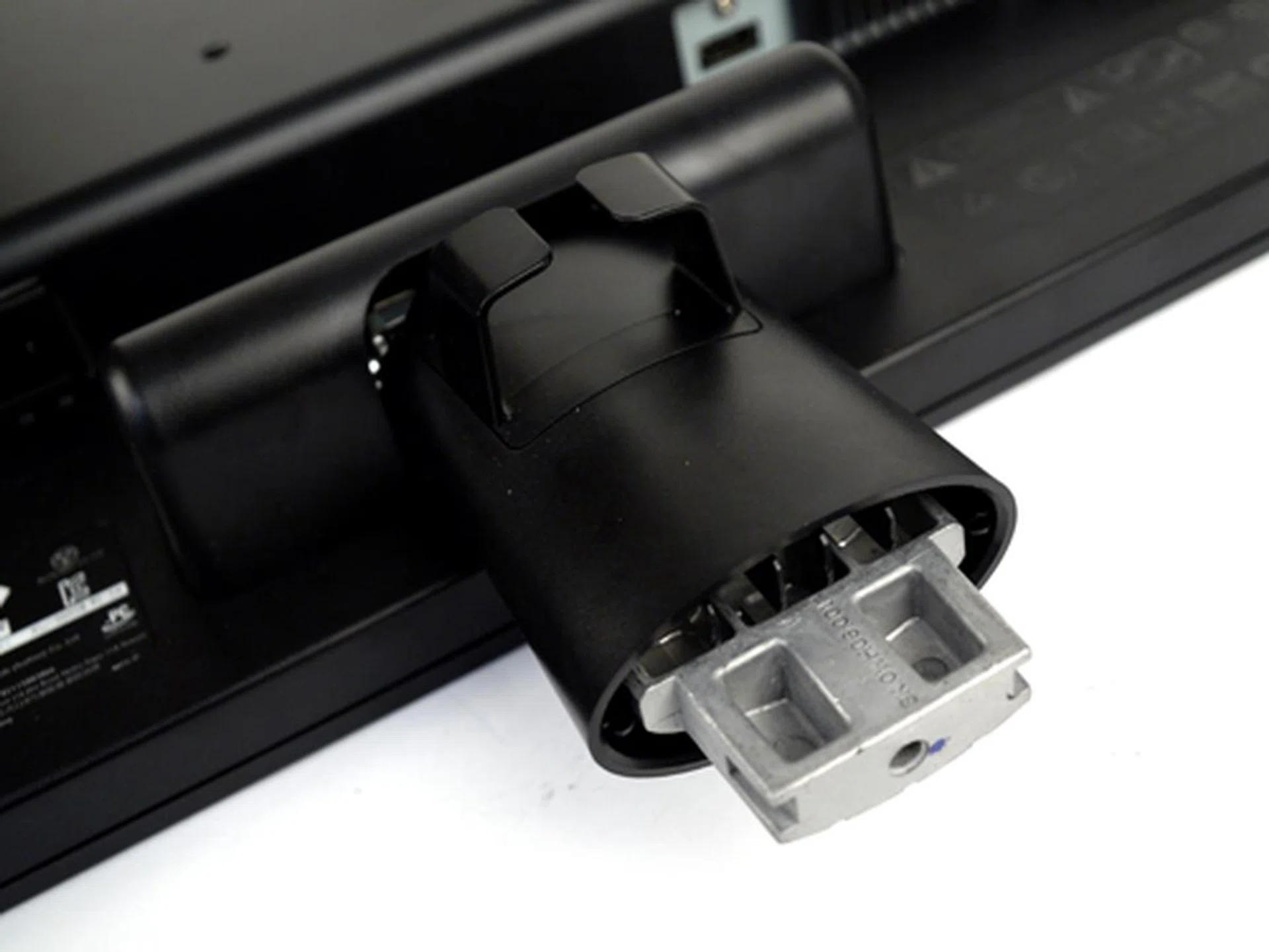 Hmm nope, that isn't some new age USB port. Just slide the V2410's spine into its base and you're good to go.