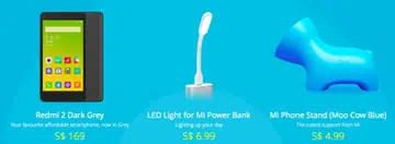 The Redmi 2 (grey), LED Light for Mi Power Bank and Mi Phone Stand are three of the five new items that will be sold on April 8 in Singapore. <br> Image source: Mi Singapore