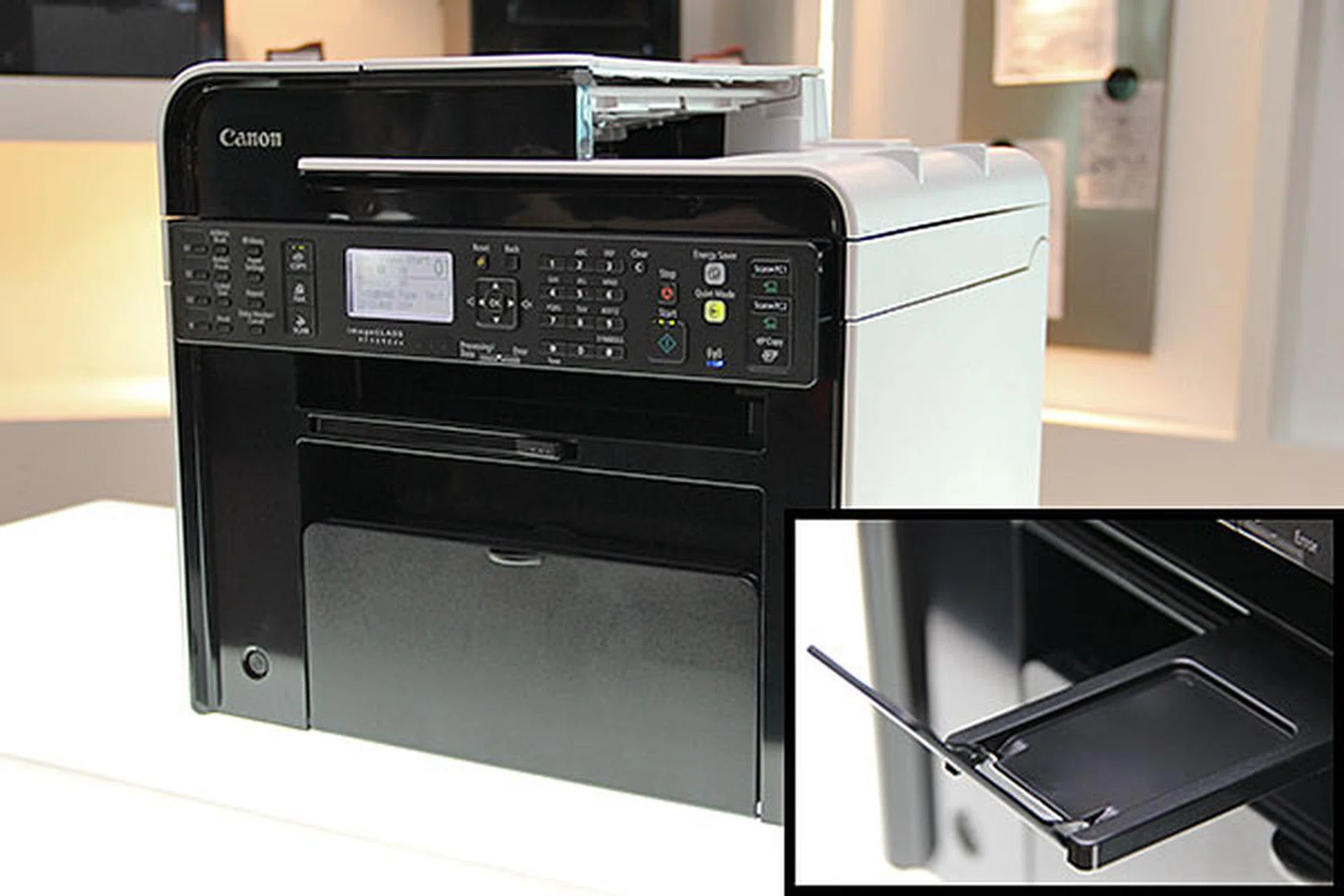 The printers can be positioned in a corner comfortably due to the lack of protruding parts. Even the extendable output tray (inset image) can be tucked into the body.