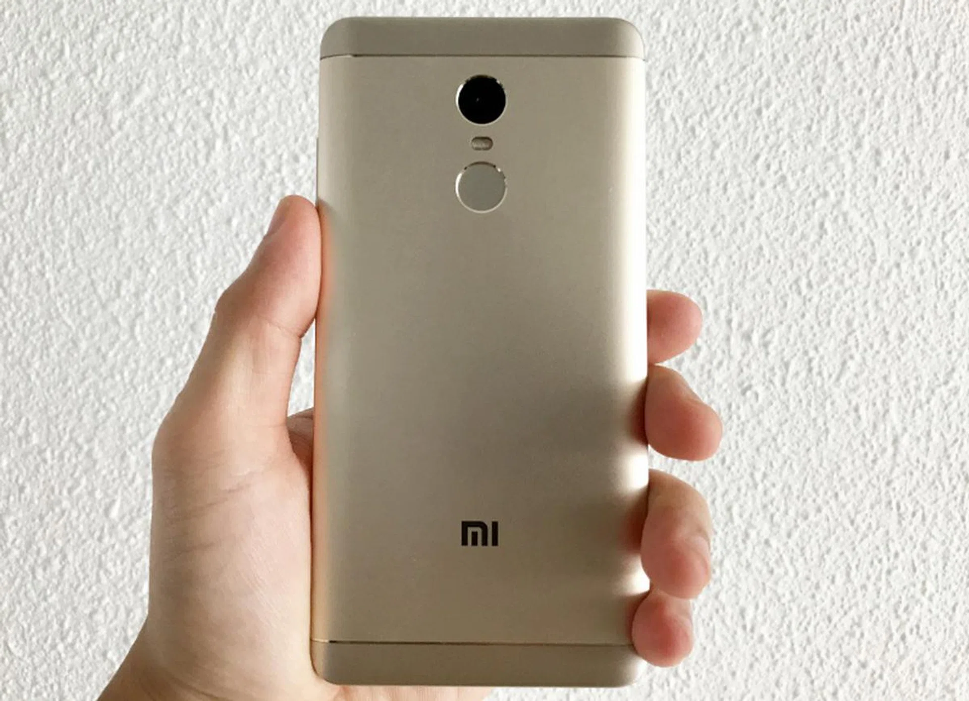The fingerprint sensor is located at the back just below the camera. It's always on, which means you can just place your finger on the sensor and it will unlock the phone. The whole process of unlocking the phone is very swift.