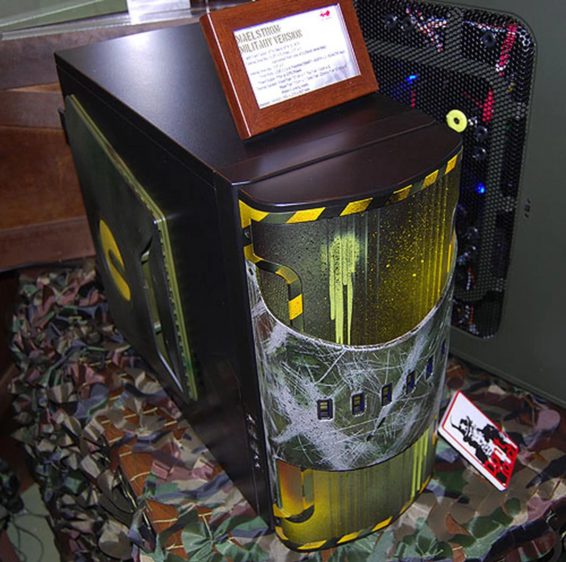  This is the In Win Maelstorm, given the military touch. It's a water cooling ready chassis that supports up to extended ATX motherboards. Up to five chassis fans can be installed.  