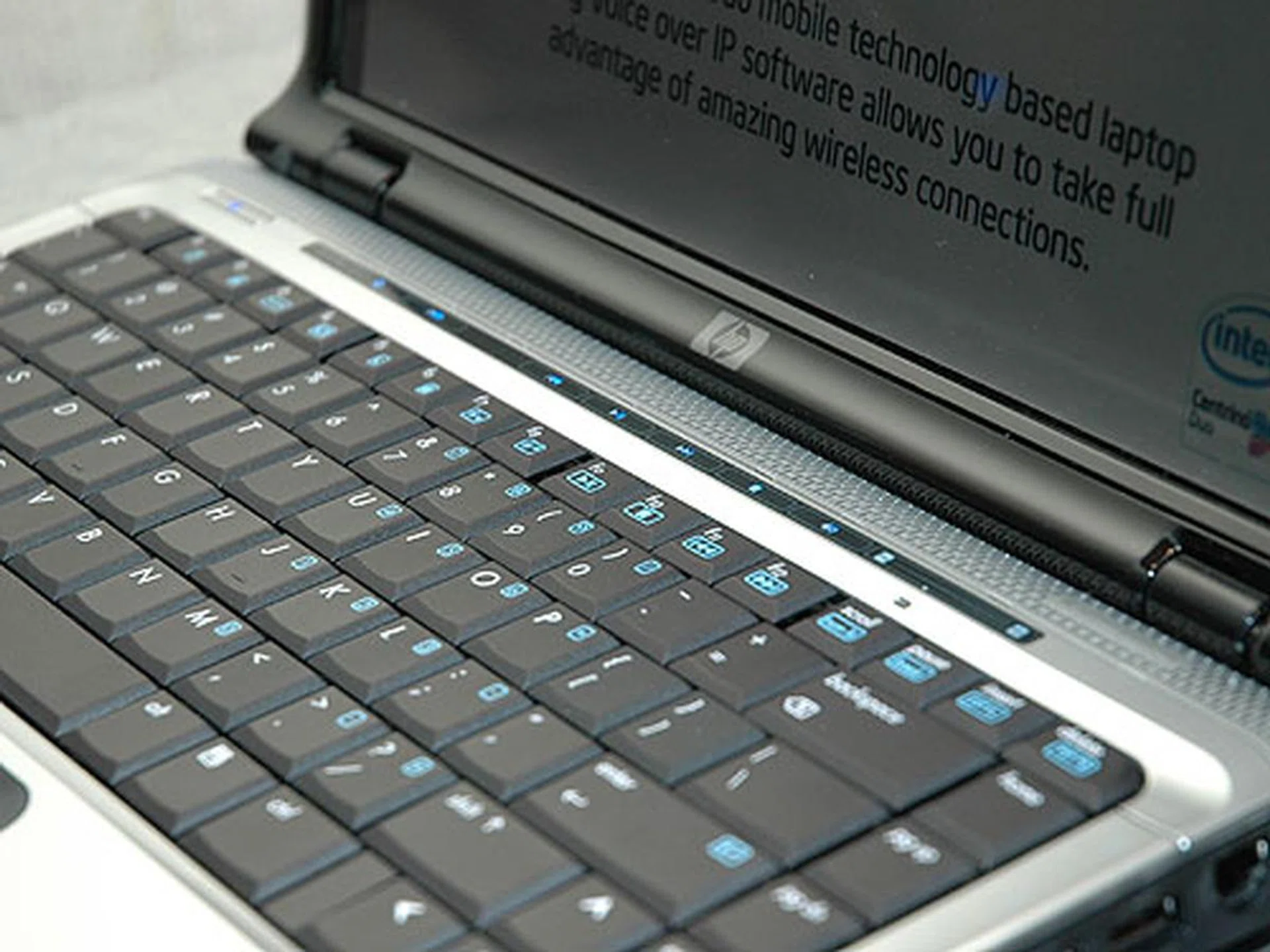 The touch sensitive capacitive buttons are lined up in a backlit panel just above the keyboard. It gives users control to quickly launch multimedia playback for DVDs, photo albums and MP3s as well as volume control and mute functions.