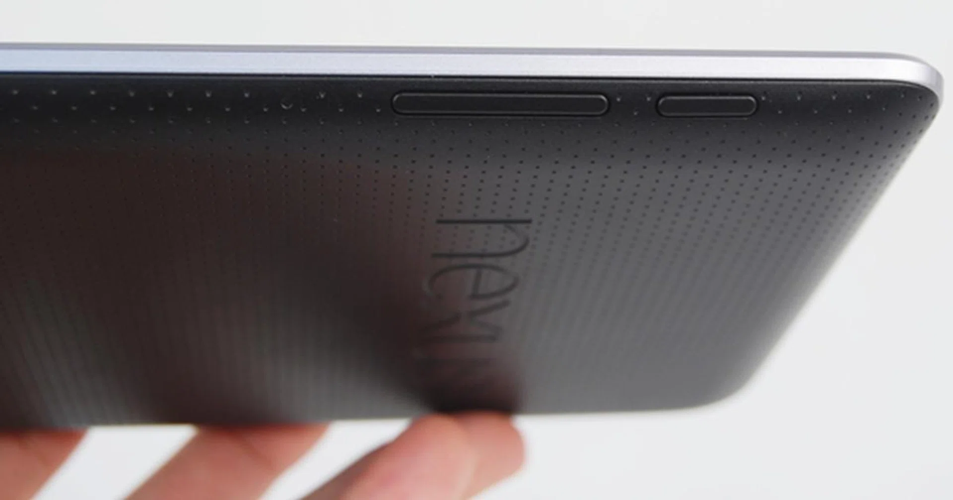 The top right edge of the Google Nexus 7 houses the power/sleep button and the volume controls. The buttons are raised slightly, hence provide good tactile feedback when pressed.