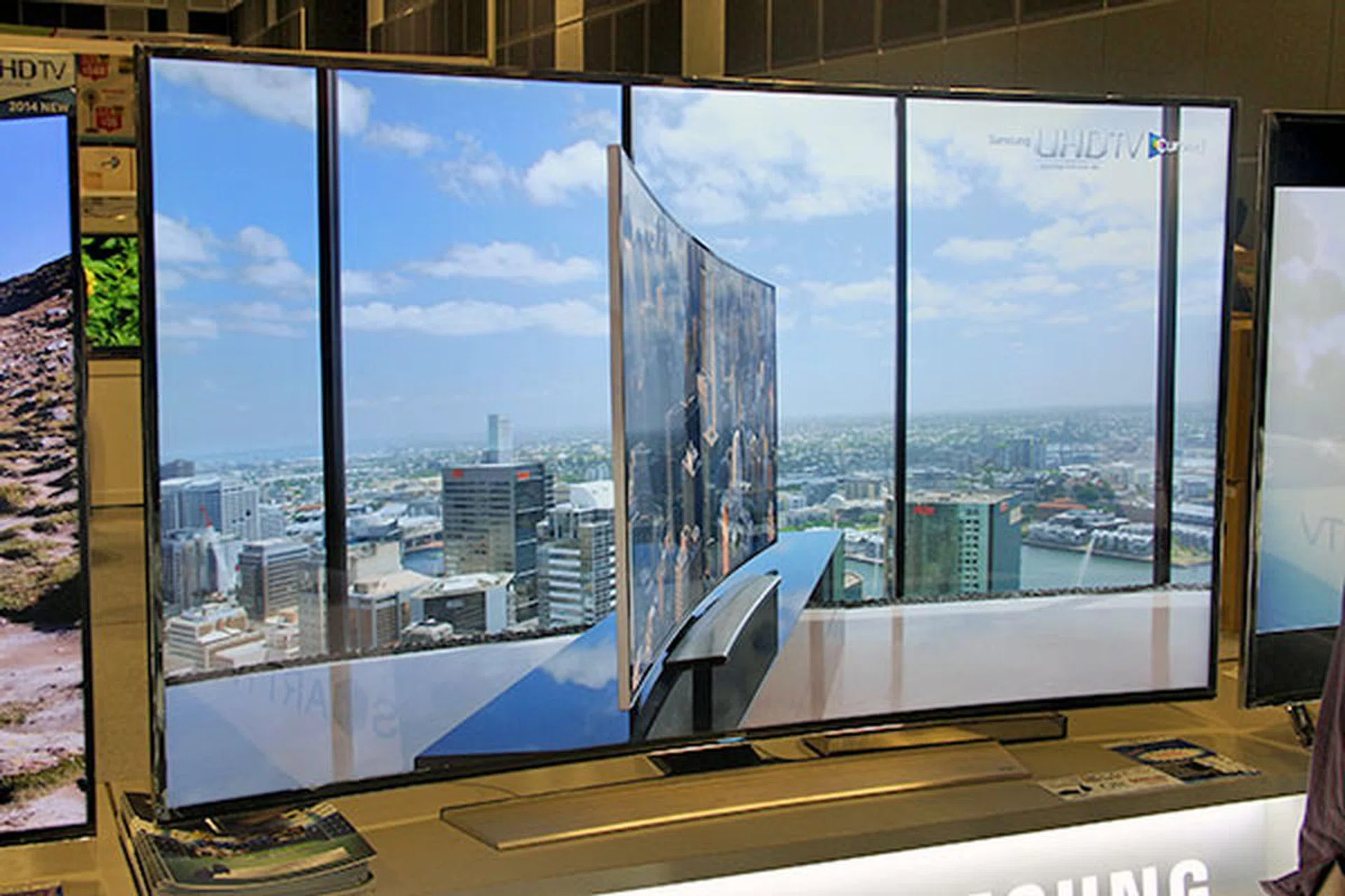 If you're feeling rich, Samsung's latest U9000 curved UHD (4K) TV is at SG Tech Show too. Other than the mind-boggling 3,840 x 2,160-pixel resolution (four times full HD), it has built-in Wi-Fi, four HDMI and three USB ports, and supports DVB-T2. Available in 65 and 55-inch screen sizes, you can find them going for $7,479 and $5,279 at Booth 423. Free gifts include either a 2-pc M7 wireless speaker and WAM-250 connect hub or a $600 voucher.
