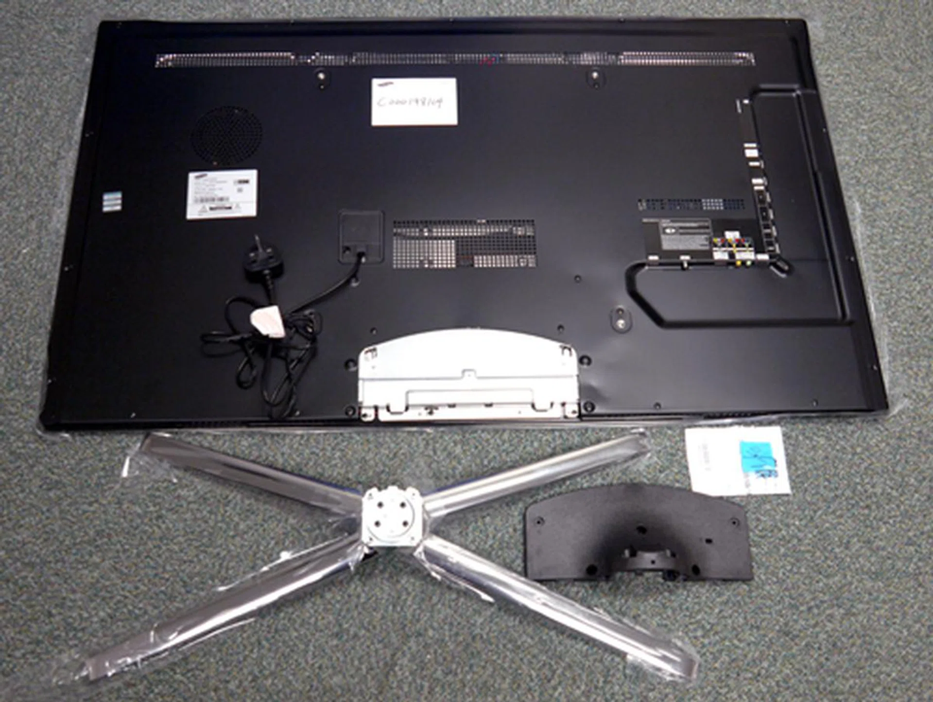 Here are some of the primary  parts you'll find out of the box. Some assembly is required in assembling the C7000, like attaching the stand and backplate to the TV for example.