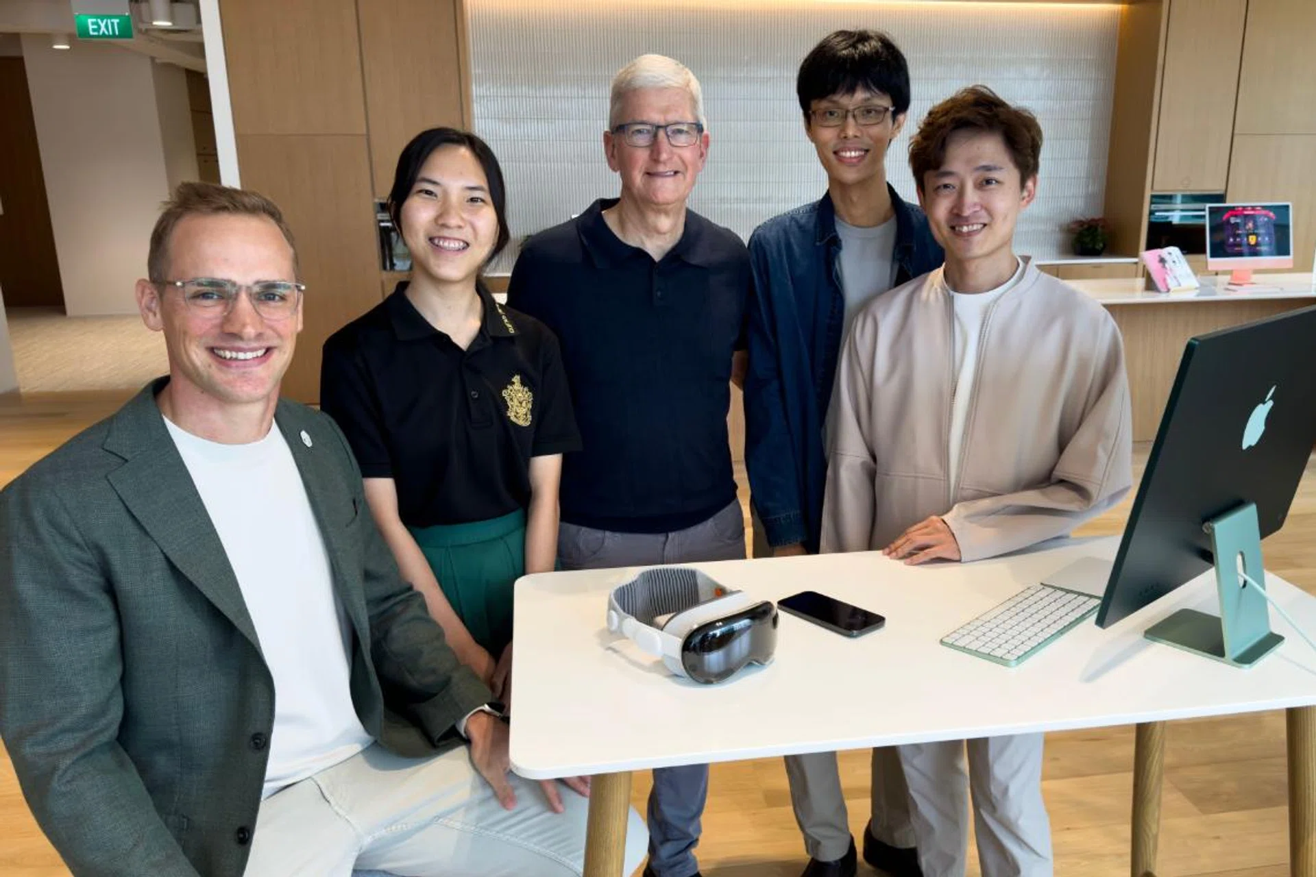Apple CEO Tim Cook meeting with developers at the recently opened Developer Center in Singapore. From left: Jakob Lykkegard, Jiang Tongyu, Chin Yong Kian, P'ng Yiwei. (Image source: Apple)